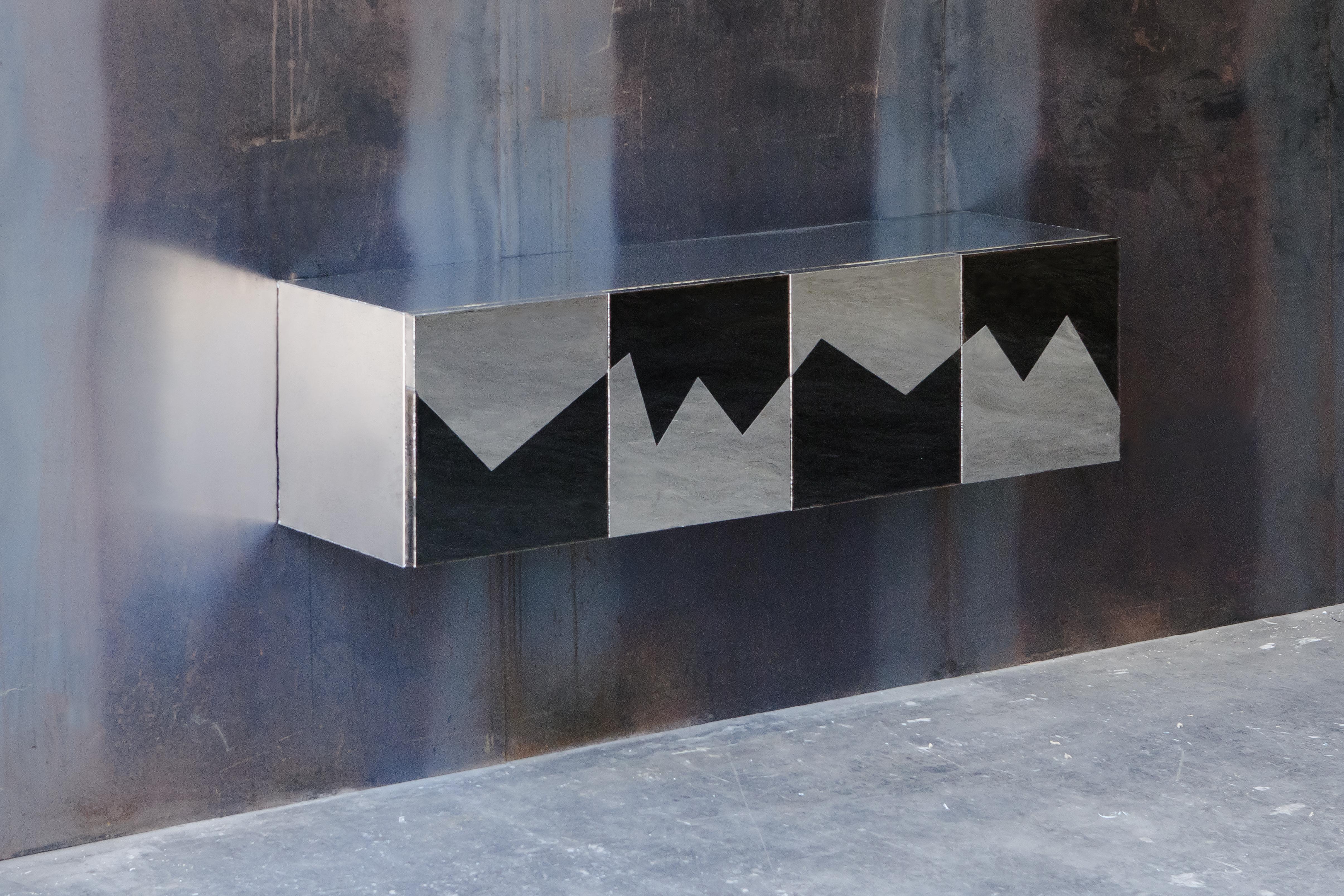 Hanging cabinet by Michael Gittings Studio
One of a kind
Dimensions: D 180 x W 40 x H 47 cm
Materials: Mirror polished stainless steel

Michael Gittings
Melbourne based designer Michael Gittings aims to
Challenge pre-conceptions around