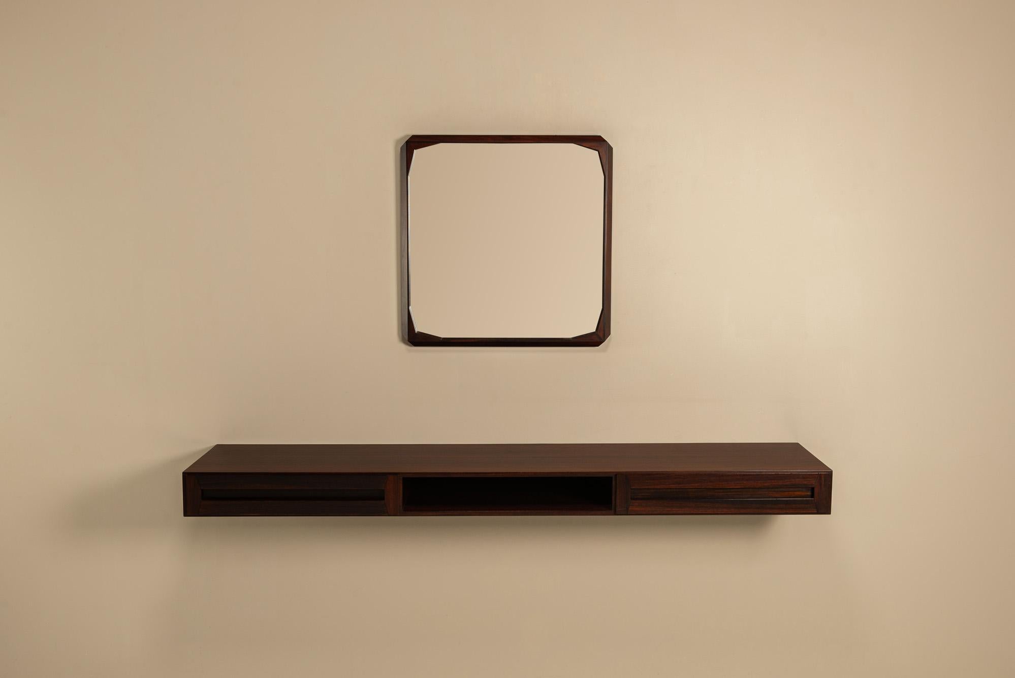 This wall-mounted console and mirror set, designed by Dino Cavalli for Tredici in the 1960s, captures the quiet elegance of Italian postwar design. Defined by clean lines and considered proportions, it reflects a sensitivity to both material and