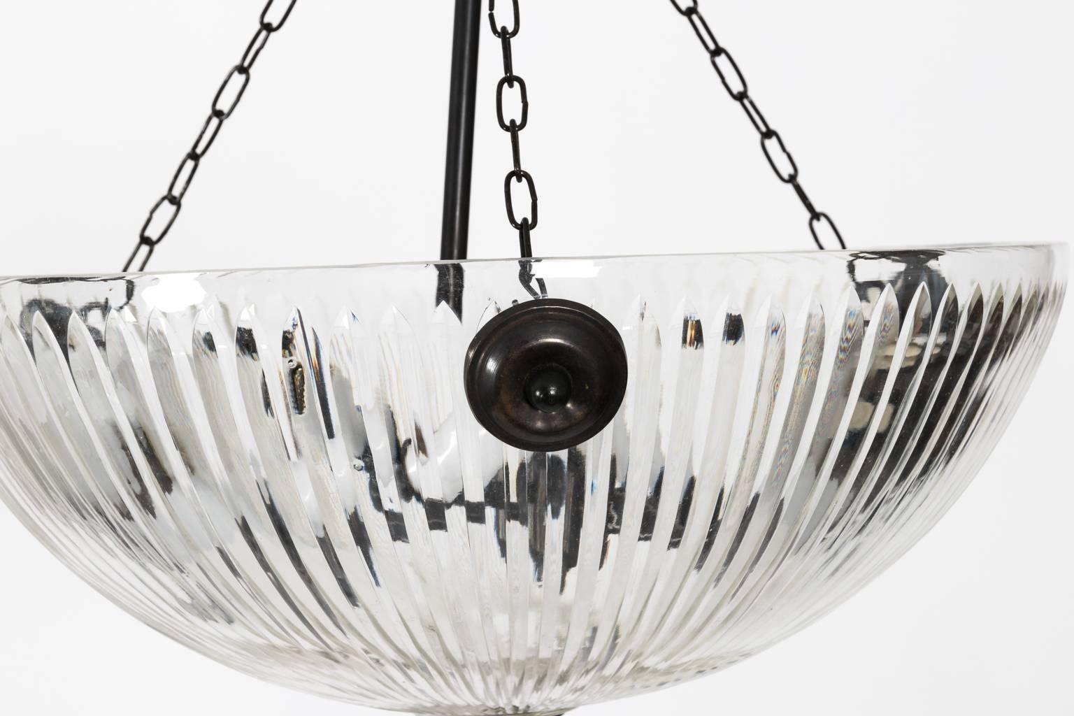 Hanging cut-glass light in a distressed bronze finish, circa mid-20th century.
 