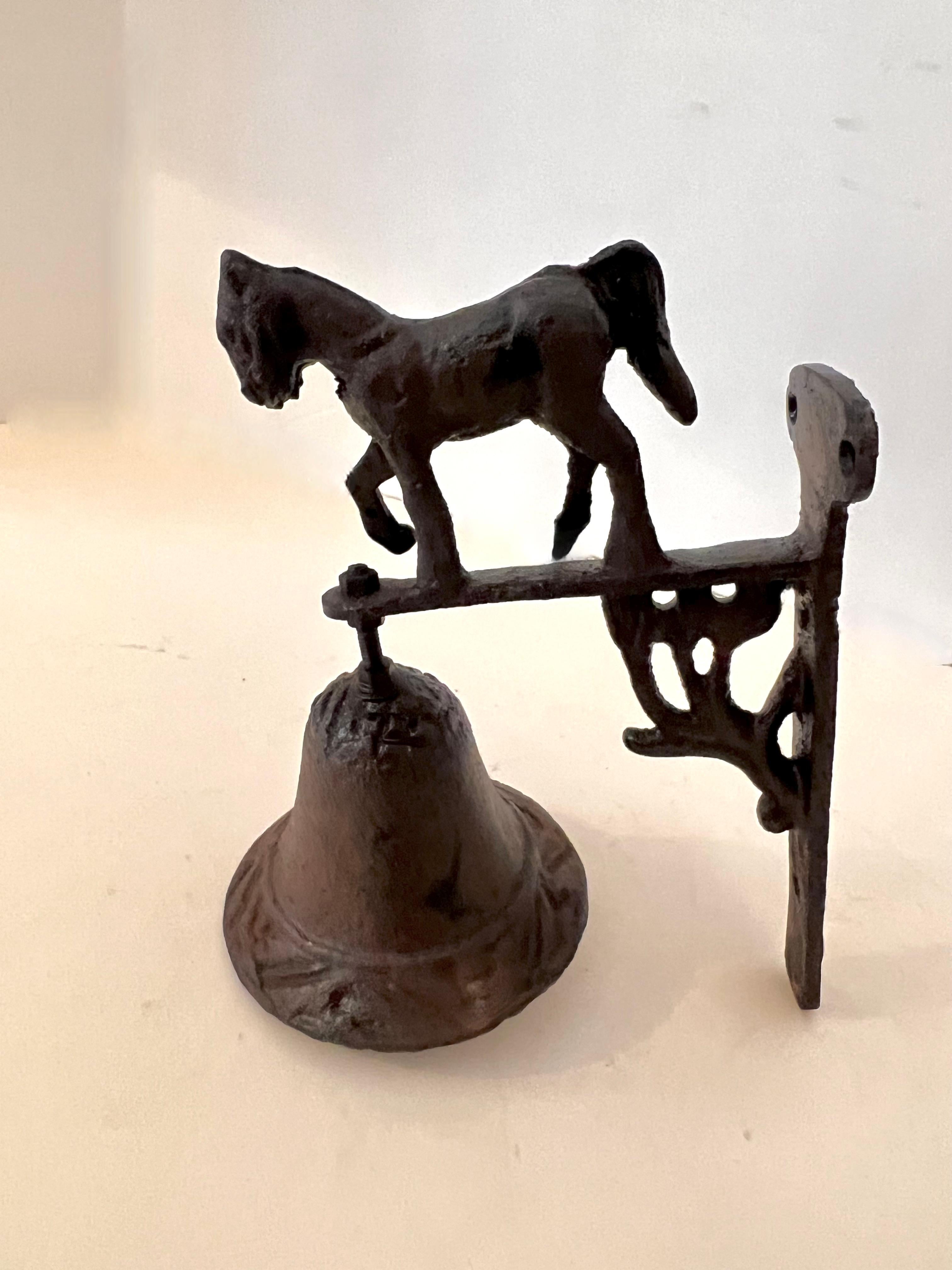 A wonderful wrought iron bell used as a notification someone has entered or moved a door - could be used at home, in a shop or in a barn. or as a decorative piece in the kitchen or garden. 

The piece is made of sturdy wrought iron and has a horse