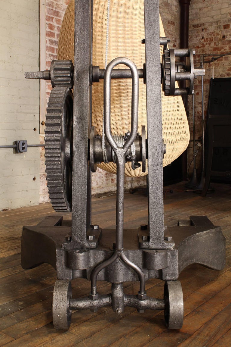 Hanging Egg Chair and 1920s Cast Iron Engine Hoist at 1stDibs