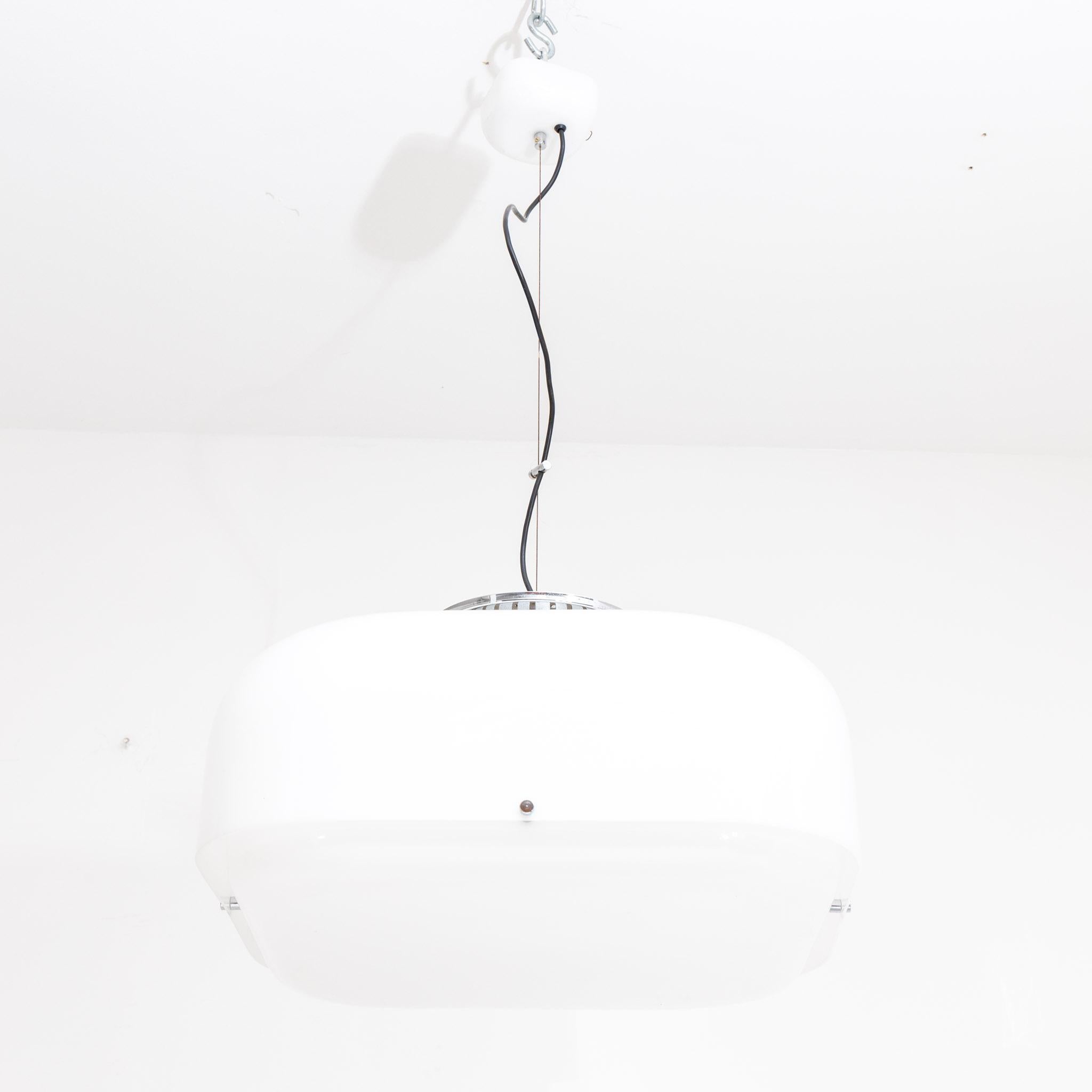 Hanging lamp with square acrylic lampshade with rounded corners and chrome elements.