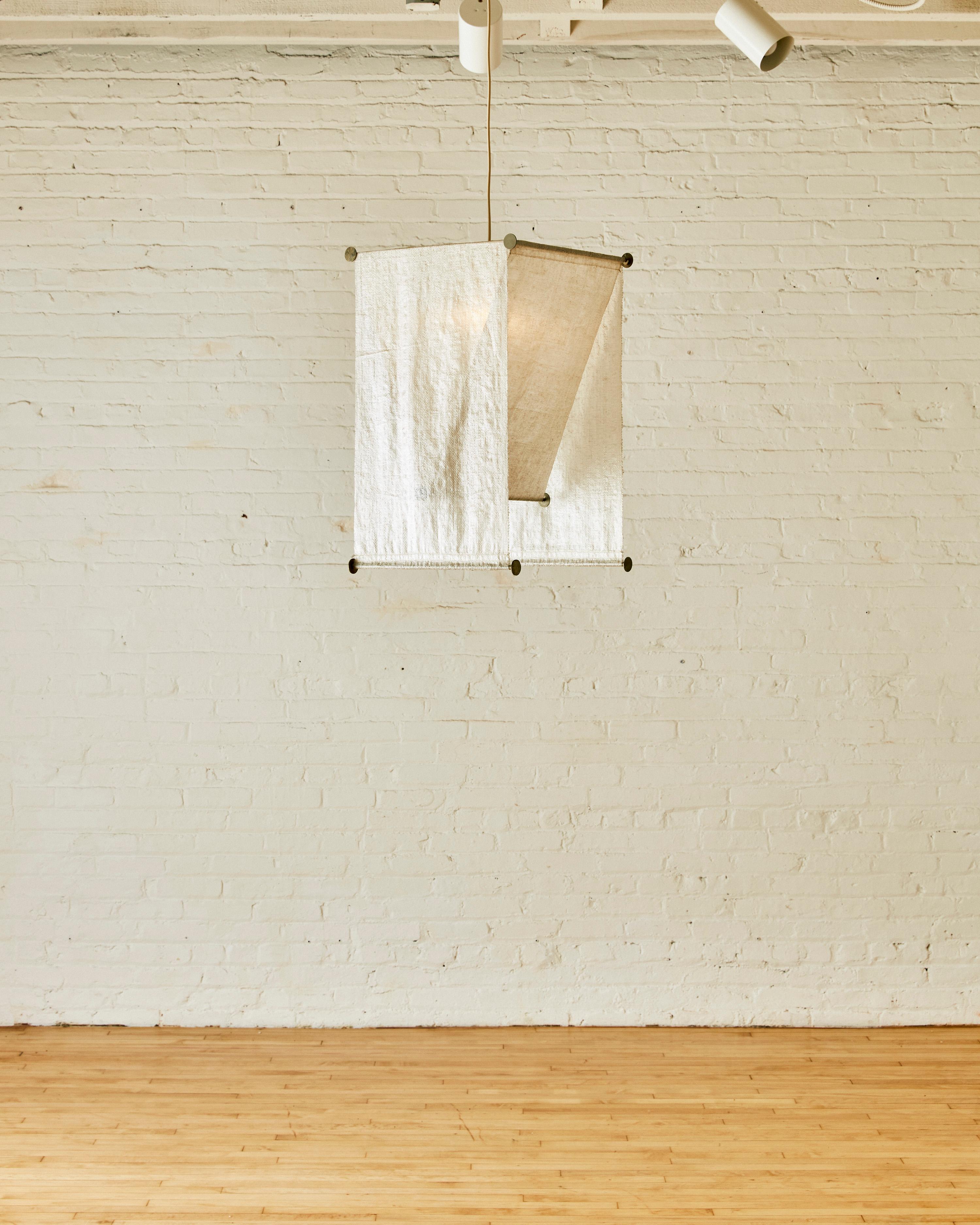 Created in 1959 for Kartell and brought to production in 1973 by Flos. Teli was born to exploit the quality of soft filtering light of Raflon, a new polyethylene fiber which was manufactured by a subsidiary of Kartell and used for packaging.