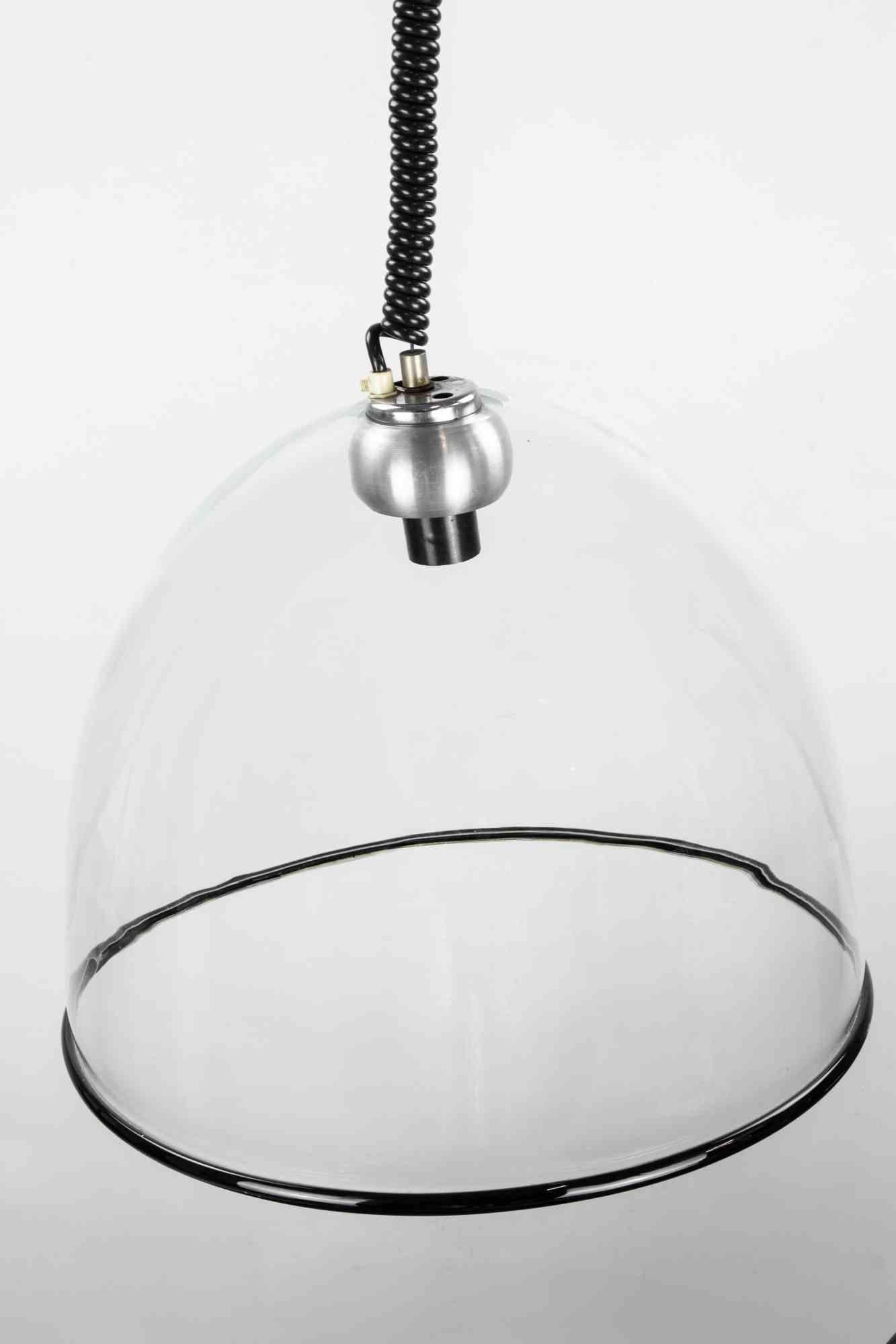 Lampada a sospensione realizzata da Leucos negli anni '70.

Buone condizioni.
