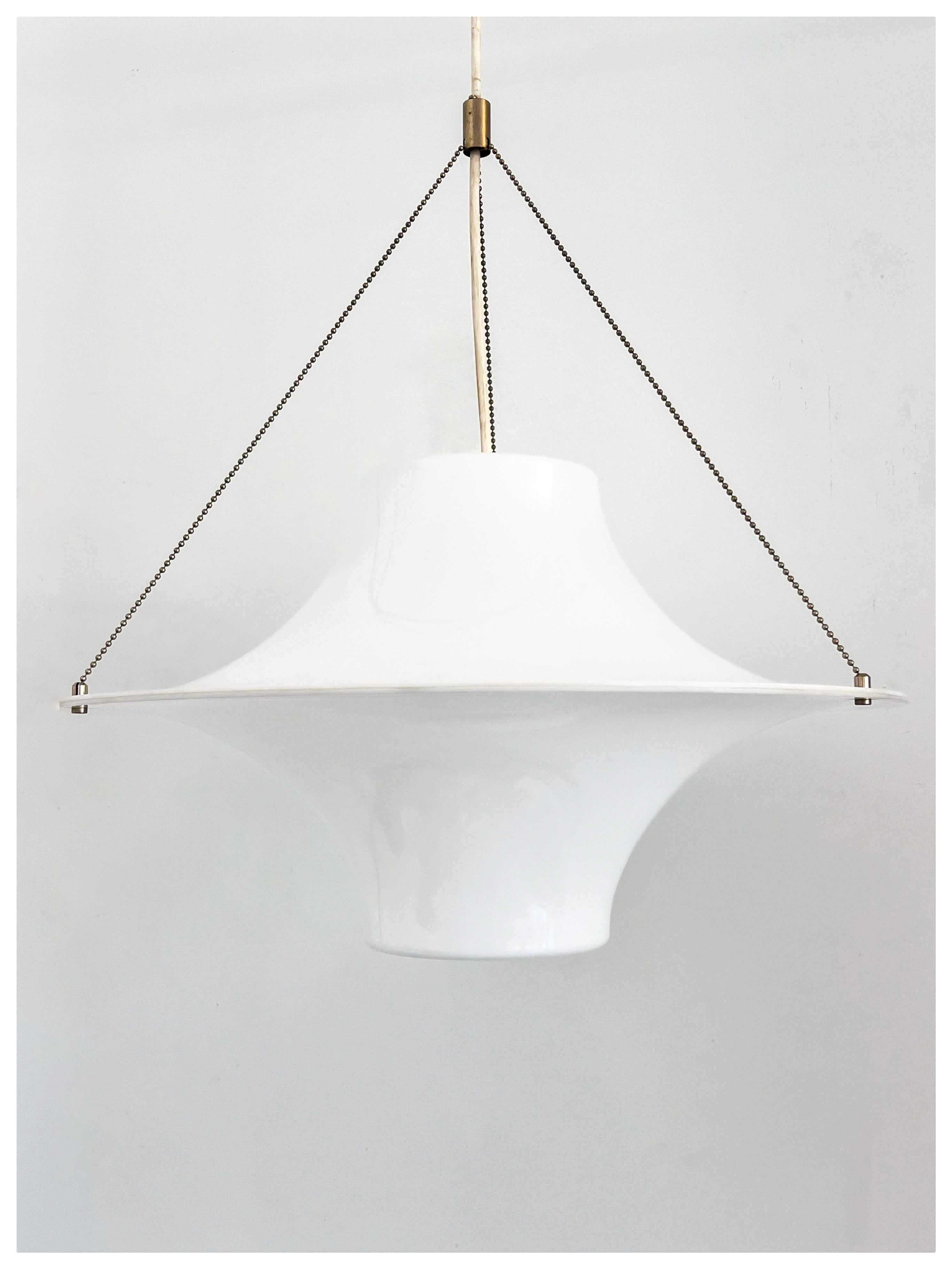 Lokki Hanging Lamp, designed in 1960 by Yki Nummi, is a famous Finnish design classics, and a pioneer among lamps made of acrylic.  This large size hanging lamp is very atmospheric when lit. It offers both direct and indirect lighting without you