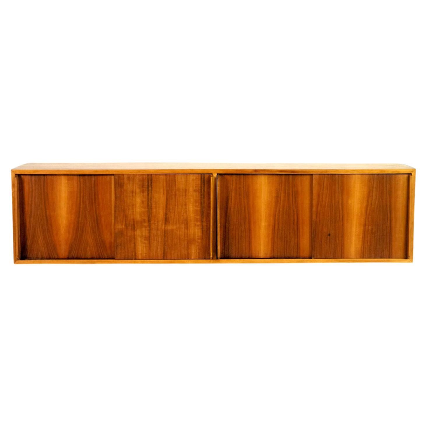 Hanging sideboard in flamed walnut, Italy 1955