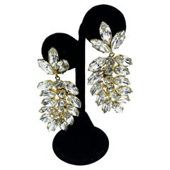 Hanging sparkly Clip-on earring  by J. SABBAGH Paris from the 1960s,gold setting