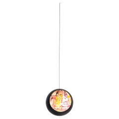 Hanging Steel Ball by Fabian Bollinger