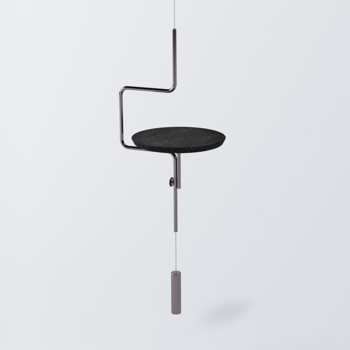 record hanging table
The disco suspended table proposes a new vision for side tables, with the fixation on the ceiling its stability is due to the counterweight of the base that is completely suspended. The height of the top can be adjusted using