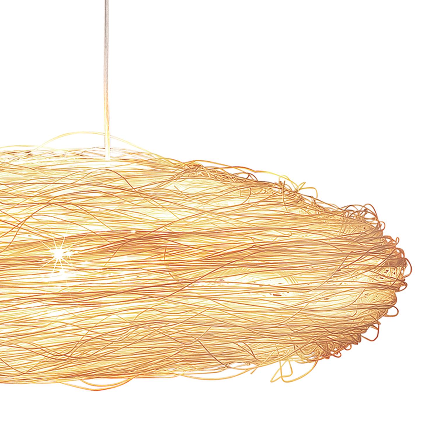 The pendant lamp diffuser is composed around a flattened tetrahydron structure, which is then clad with superfine extruded rattan, generating a warm and beautiful light quality. Hanging World pendant light by Ango has been used as bed side lamps,