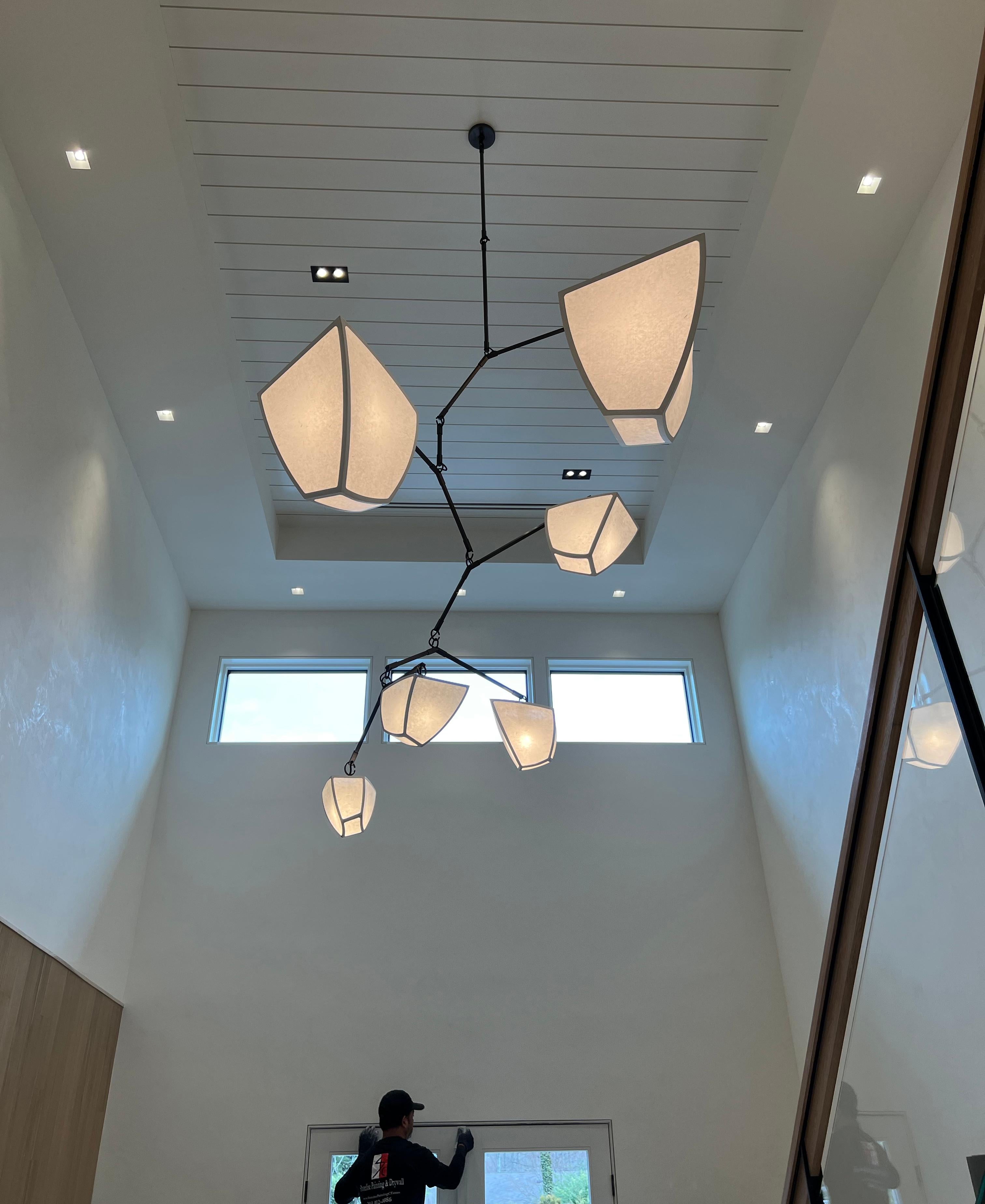 Hanji 6: ABCDFG - is a mobile chandelier with 6 glowing, handmade Hanji paper polyhedron shaped shades arranged in size order. We can make a Hanji fixture in any of our mobile configurations- Cassiopeia, Ivy, or Constantin.

Hanji Paper is an