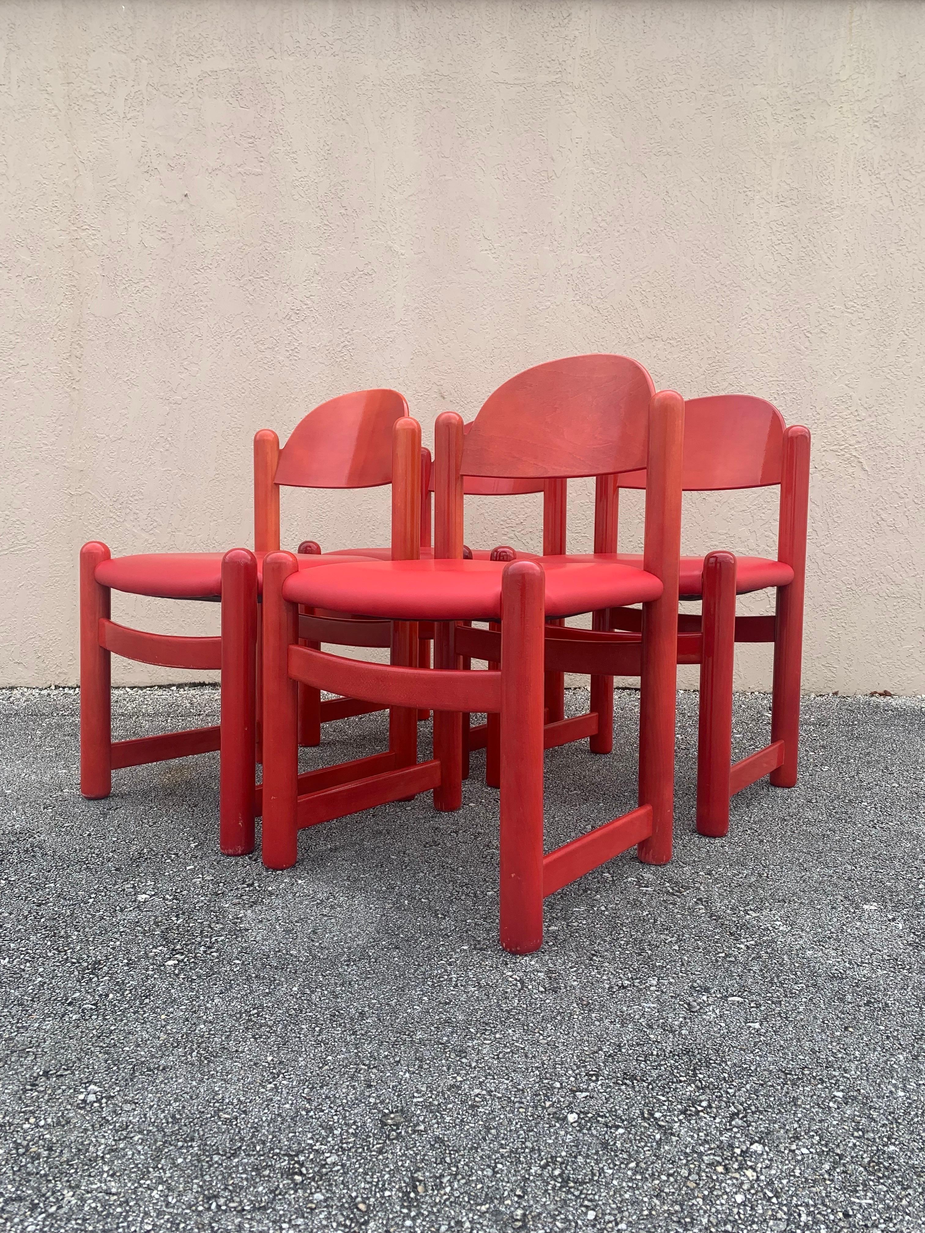 Hank Lowenstein “Padova” dining chairs in oak and leather. Finished in a beautiful vibrant red lacquer with red leather seats. Will add a lively pop of color to any dining room or breakfast nook.

In good vintage original condition with light signs