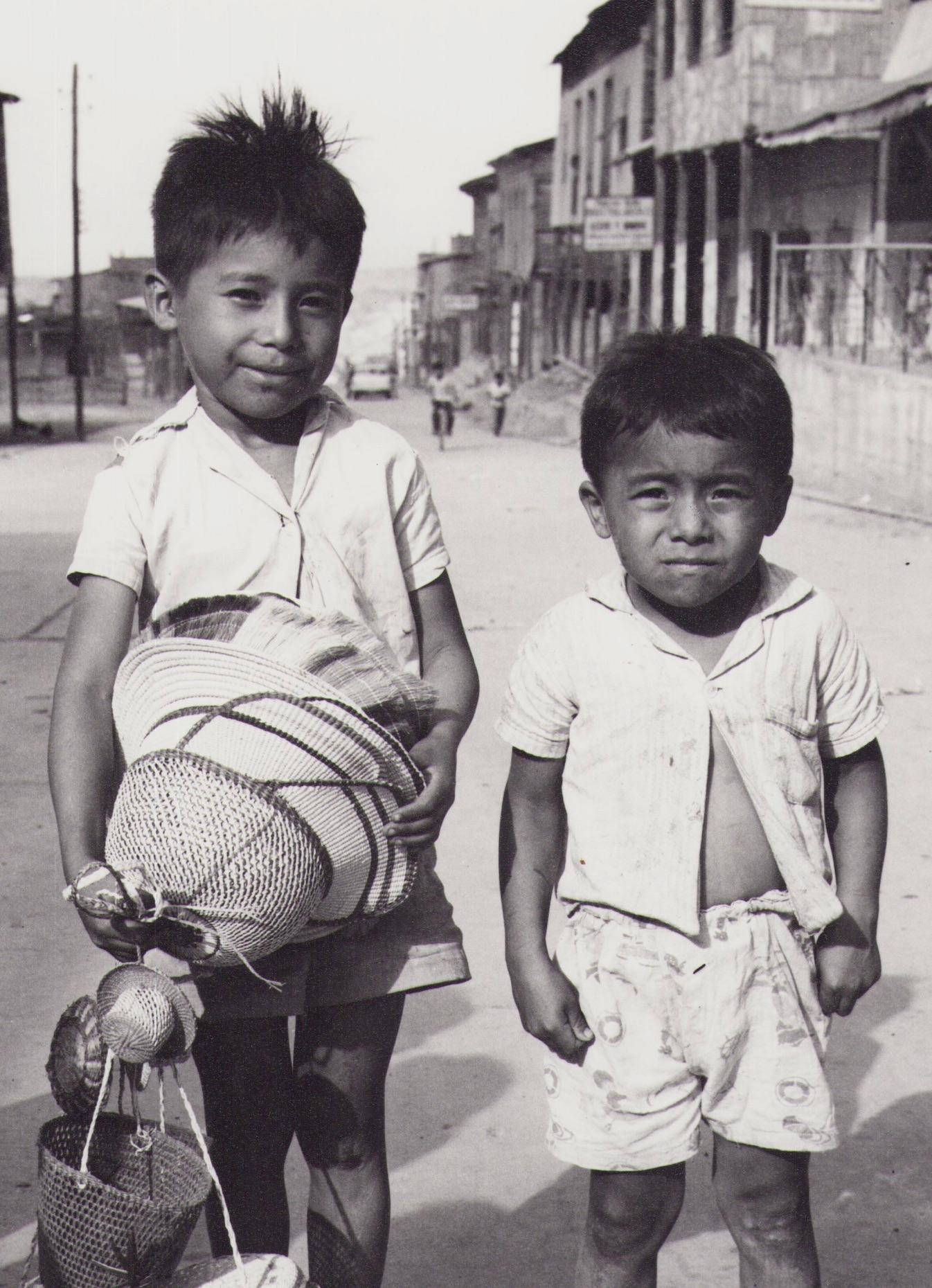 Ecuador, Boys, Montecristi, Black and White Photography, 1960s, 16, 2 x 23 cm - Gray Portrait Photograph by Hanna Seidel