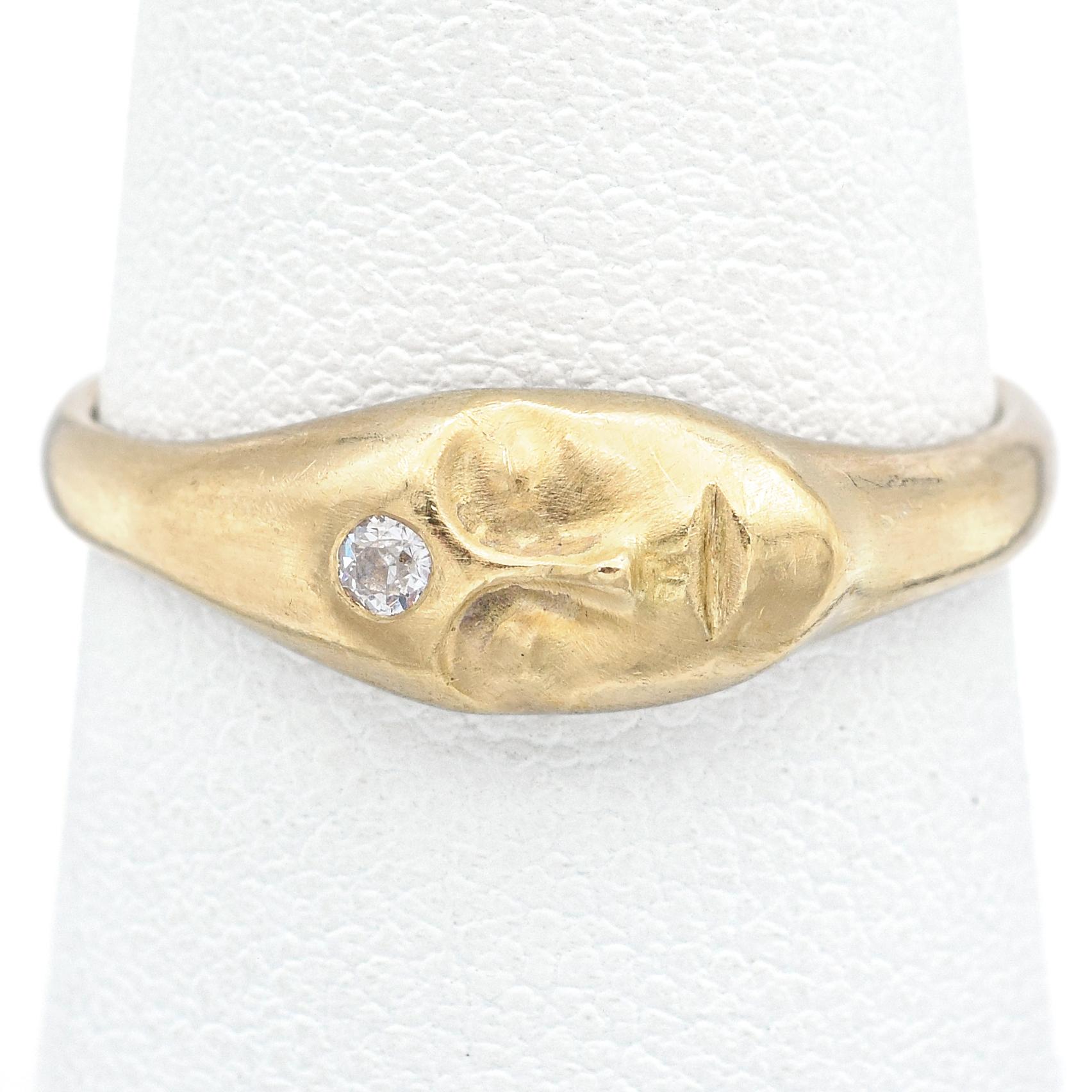 Weight: 4.6 Grams
Stone: Accent Diamond (2 mm)
Face of Ring: 20.0 x 6.5 x 3.7 mm
Ring Size: 8
Hallmark: 18K Tested

Item #: BR-1078-101823-04