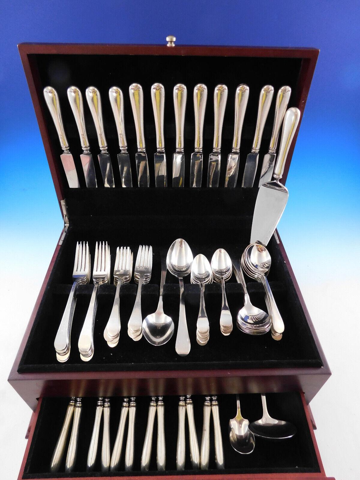 The unadorned Hannah Hull pattern, known for its simple, clean lines, was inspired by old colonial design and was first introduced by Tuttle in 1927.
Hannah Hull by Tuttle sterling silver Flatware set, 78 pieces. This set includes:

12 Knives, 8