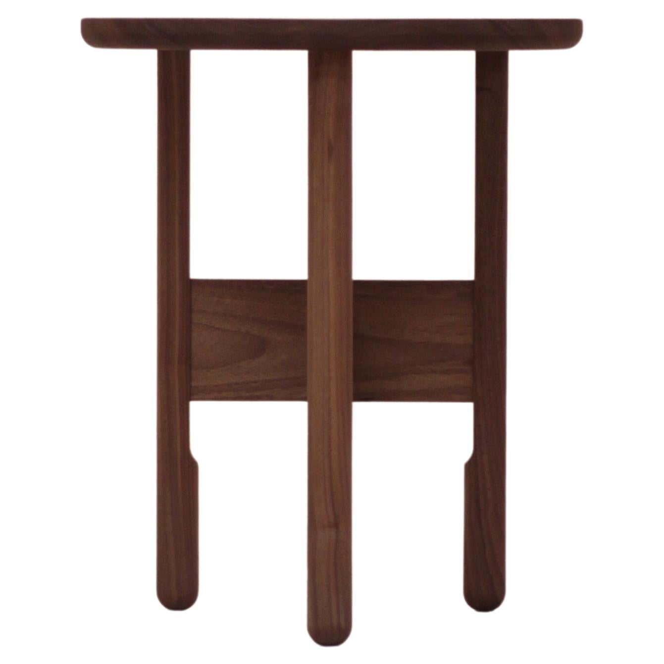 Simple, elegant and iconic the Hanne side table is the perfect companion to your favorite sofa or lounge chair. Featuring a distinctive lowered leg brace, this 3 legged table is sturdy and playful, changing appearance from every angle. The round