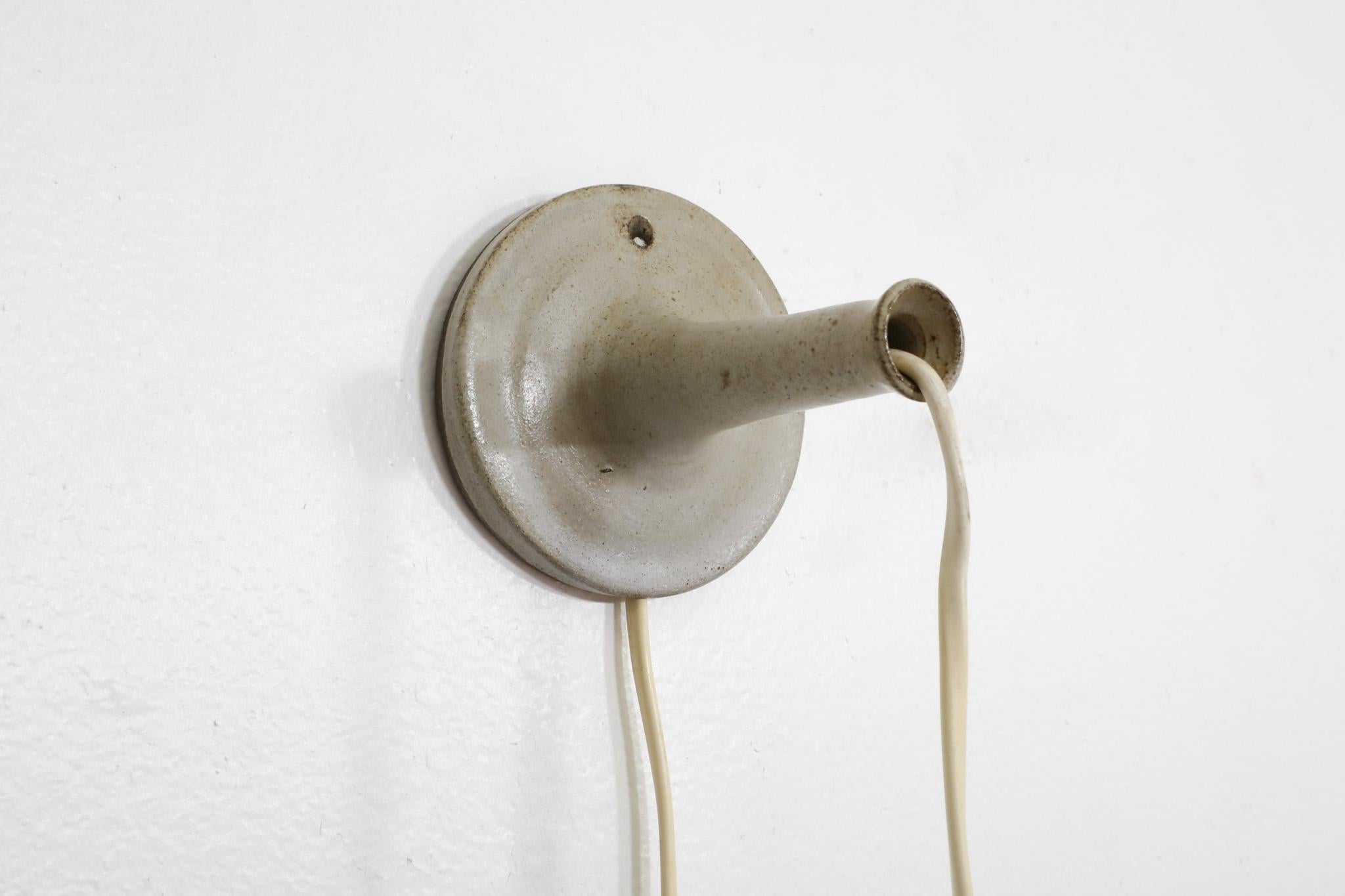 Ceramic Hannie Mein ceramic wall sconce For Sale