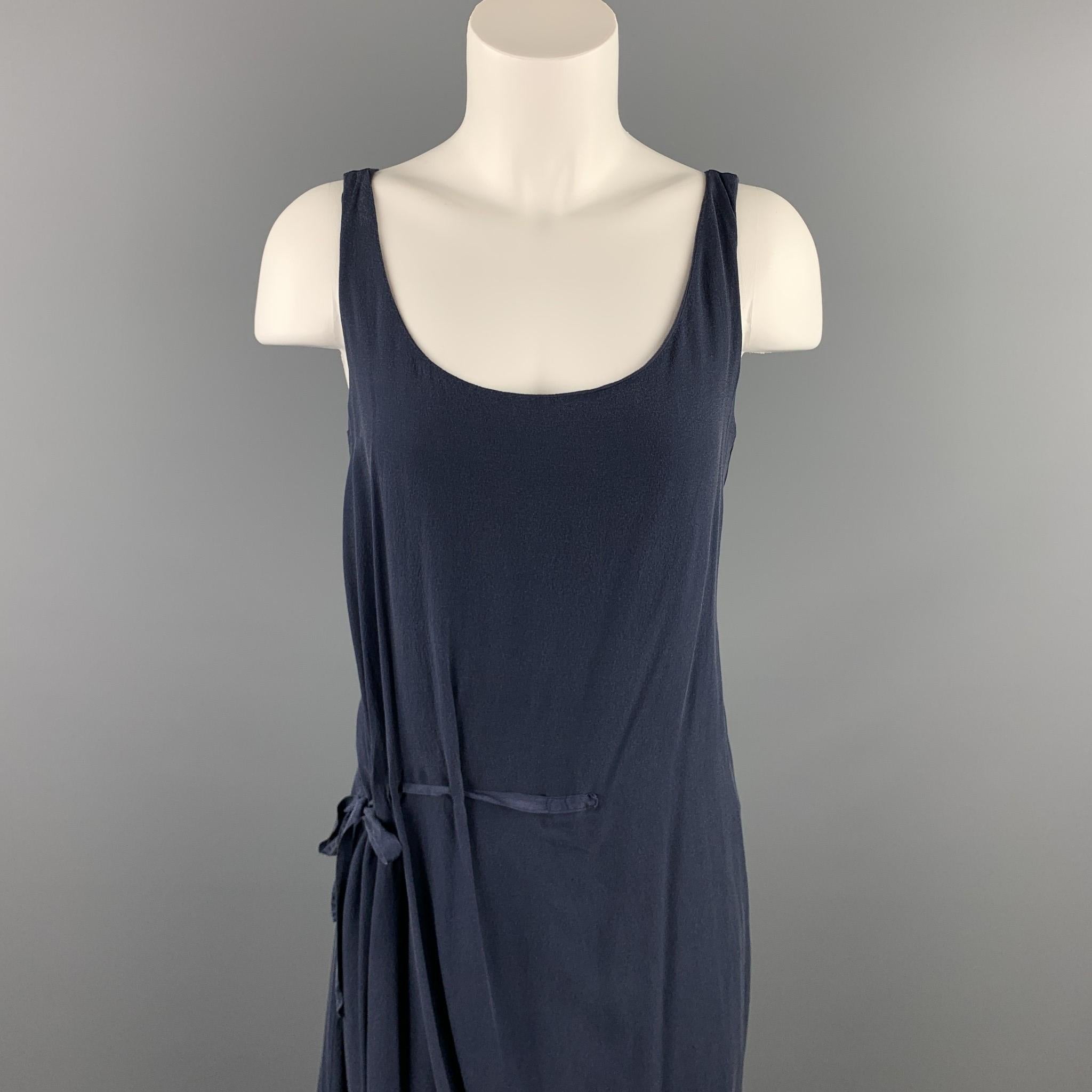 HANNOH sleeveless dress comes in a navy chiffon silk / cotton featuring a gathered tie detail and a scoop neck. Made in France.

Good Pre-Owned Condition.
Marked: F 38

Measurements:

Bust: 30 in. 
Waist: 34 in. 
Hip: 40 in. 
Length: 35.5 in. 