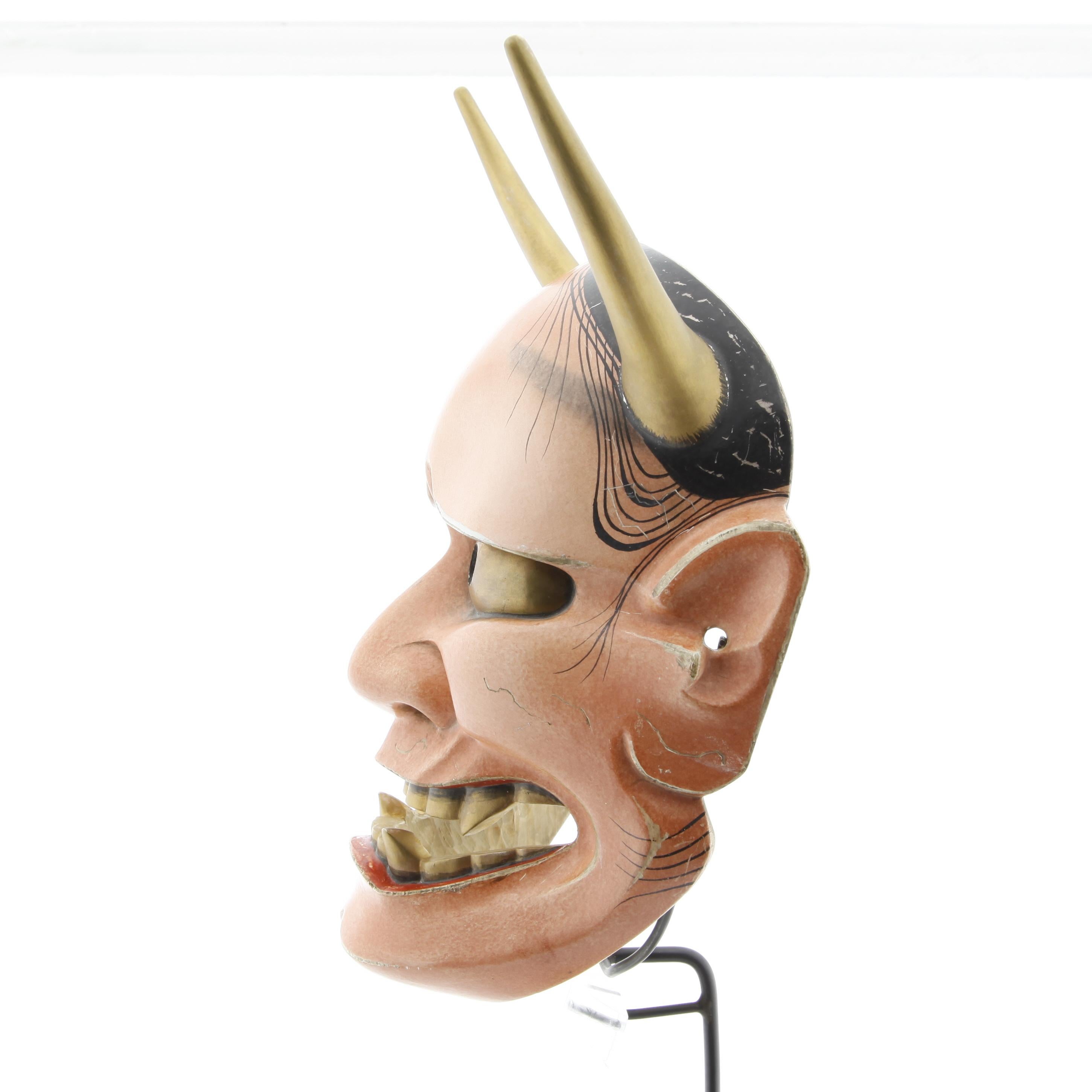 Han'nya (Noh Mask of a Demon) by Tanaka 

Date: 20th century
Size: 21.5 x 17.5 cm; Horns length: 10.5 cm

Hannya is perhaps one of the most recognizable character from Japanese theatre, due in part to the spectacular mask that depicts her, with