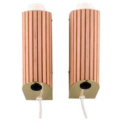 Hans Agne Jakobsson '1919-2009', a Pair of Wooden and Brass Wall Lamps