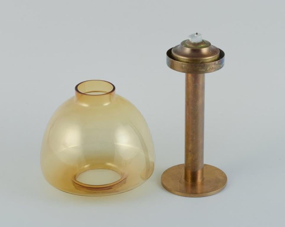 Swedish Hans-Agne Jakobsson (1919-2009), candlestick in brass and smoked glass.