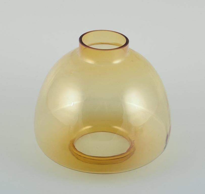 Late 20th Century Hans-Agne Jakobsson (1919-2009), candlestick in brass and smoked glass.