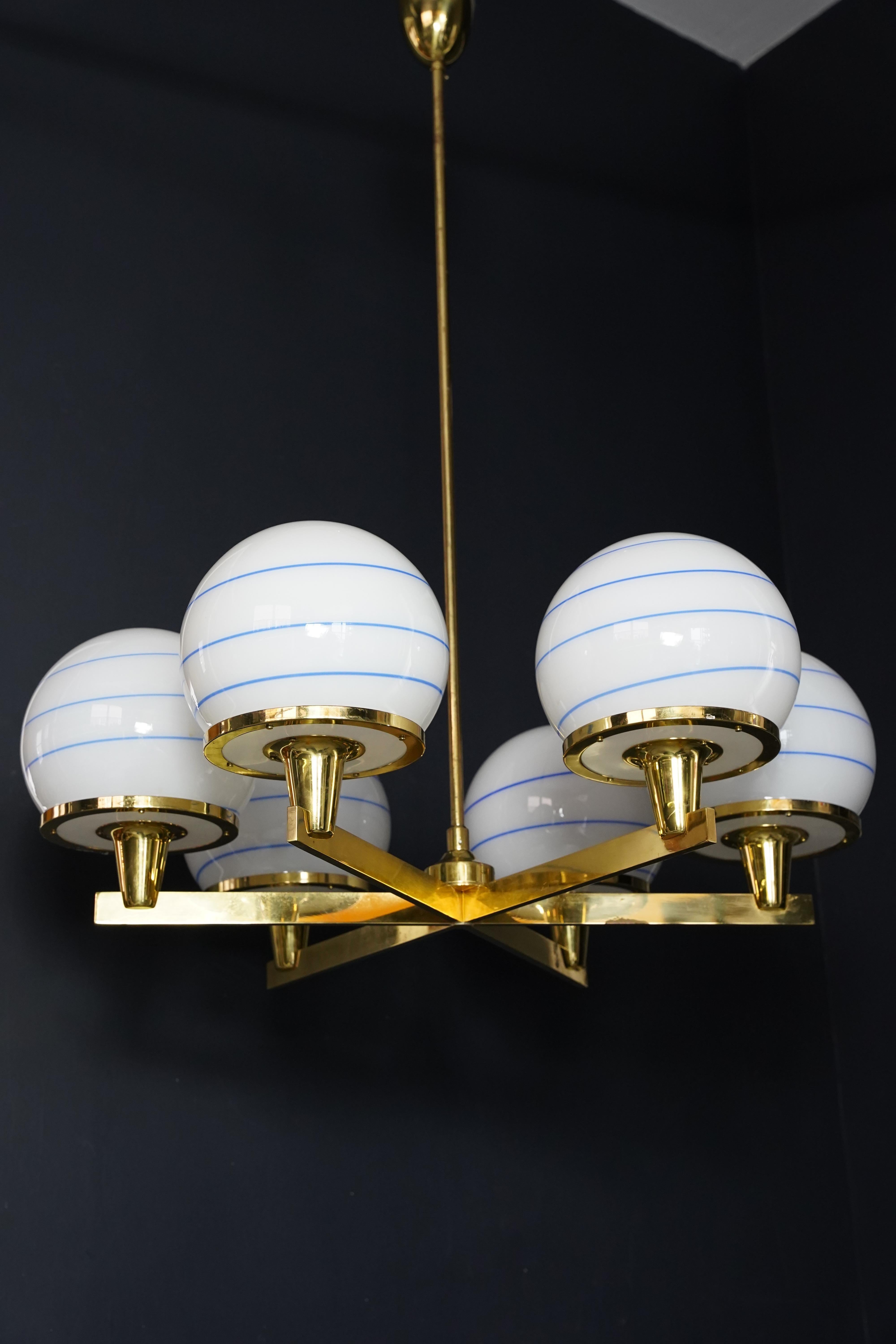 20th Century Hans-Agne Jakobsson 6 arm brass chandelier, glass shades white ball, 1960 Sweden For Sale