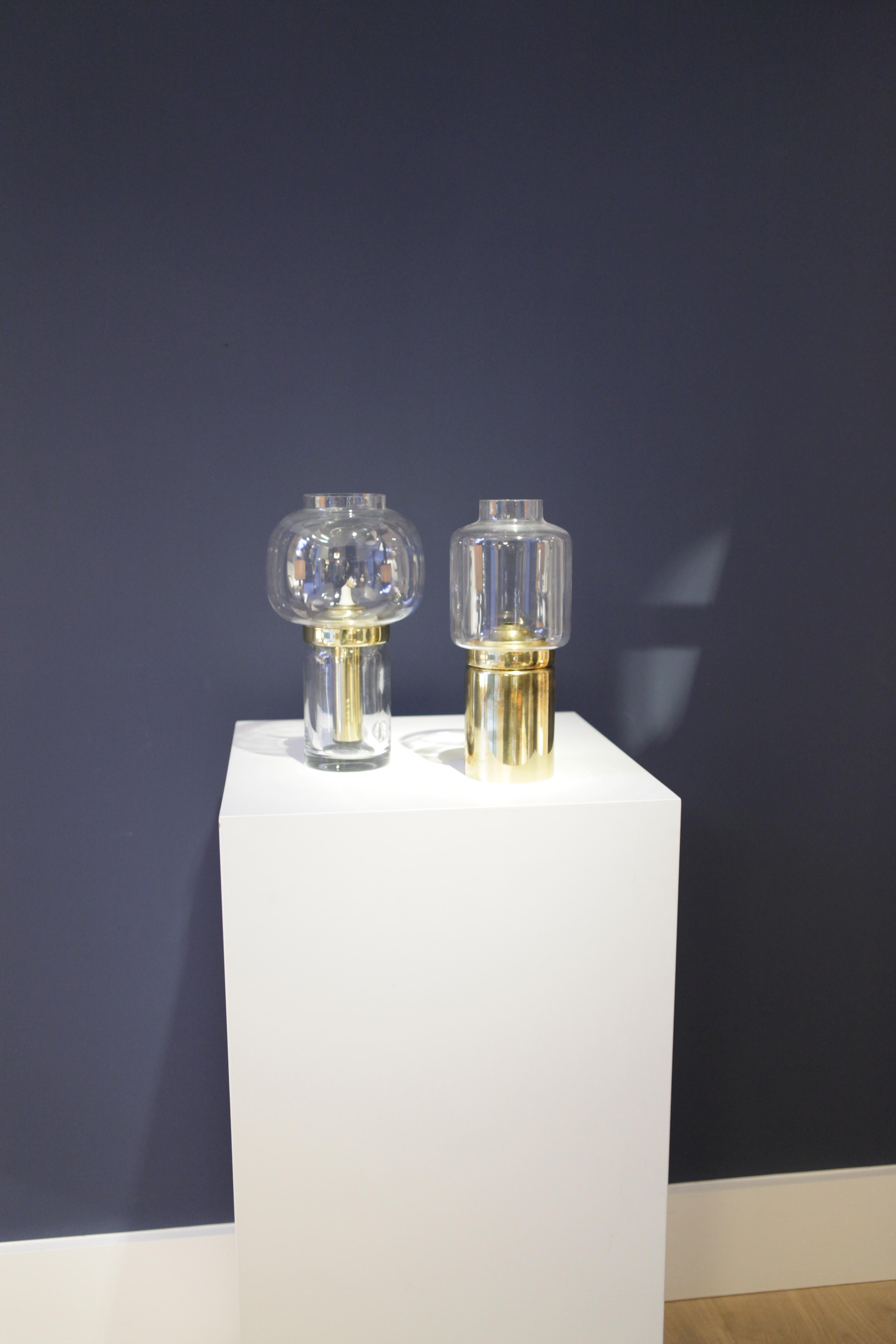 A pair of Hans-Agne Jakobsson brass and glass lanterns.
Markaryd, Sweden 1960
Model L 183/95.