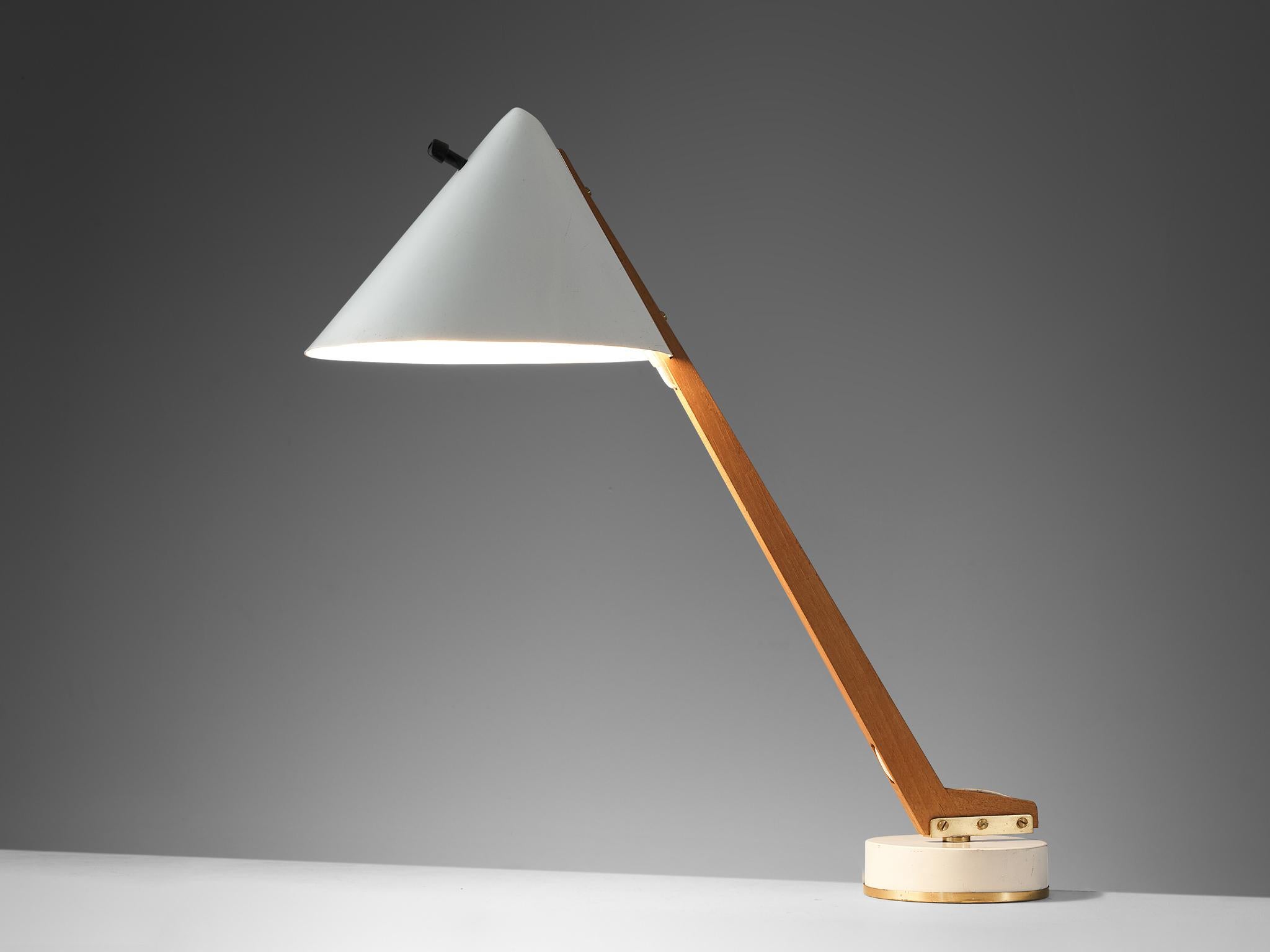 Hans-Agne Jakobsson, produced in Markaryd, table lamp 'model B54', aluminum, brass and teak, Sweden, circa 1955

Desk light designed by the Swedish designer Hans-Agne Jakobsson. The light features a teak, tapered and slanted base, which rests on a