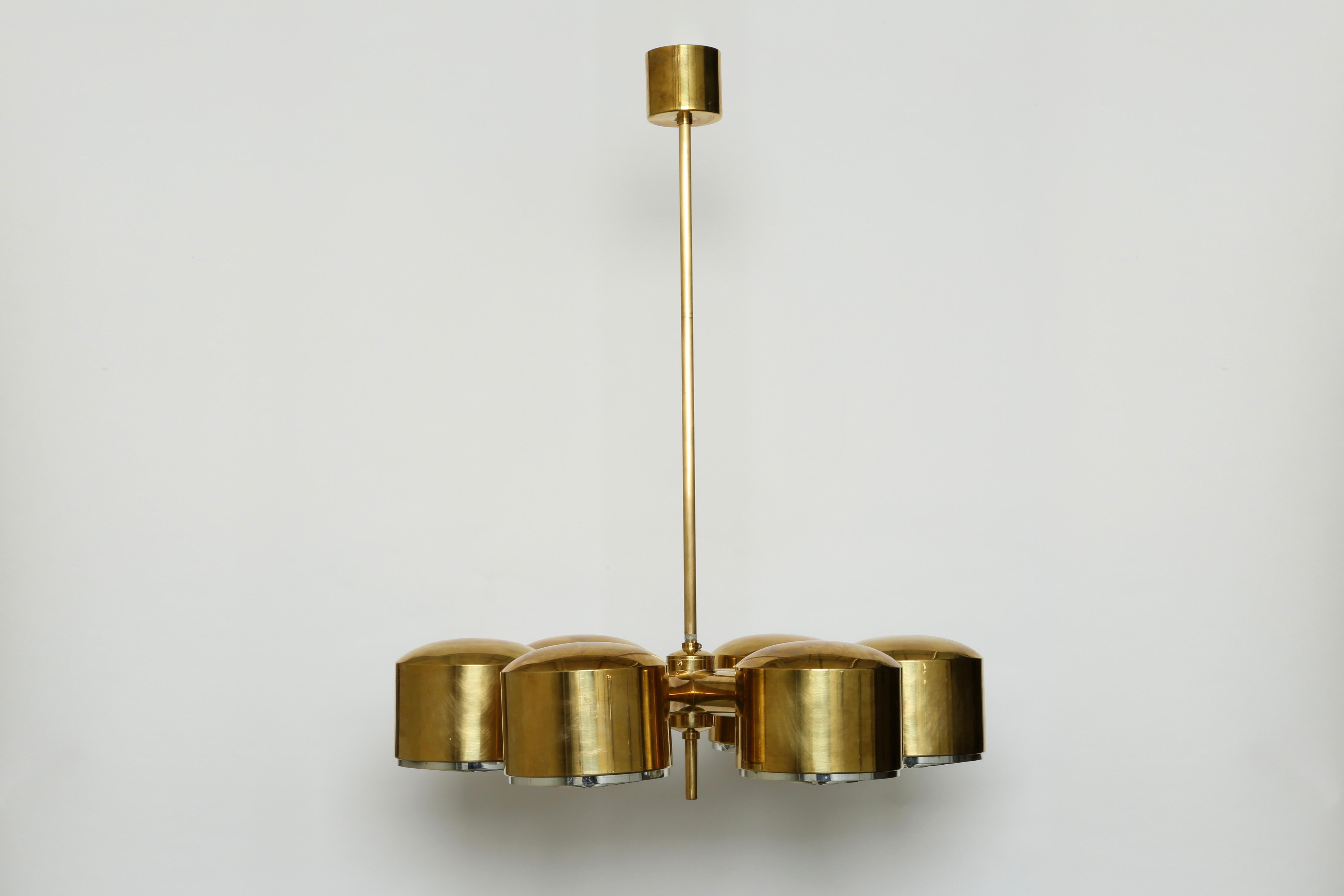 Hans-Agne Jakobsson six-light chandelier.
Sweden, 1960s.
Brass, acrylic diffusers.
Manufacturer's label.