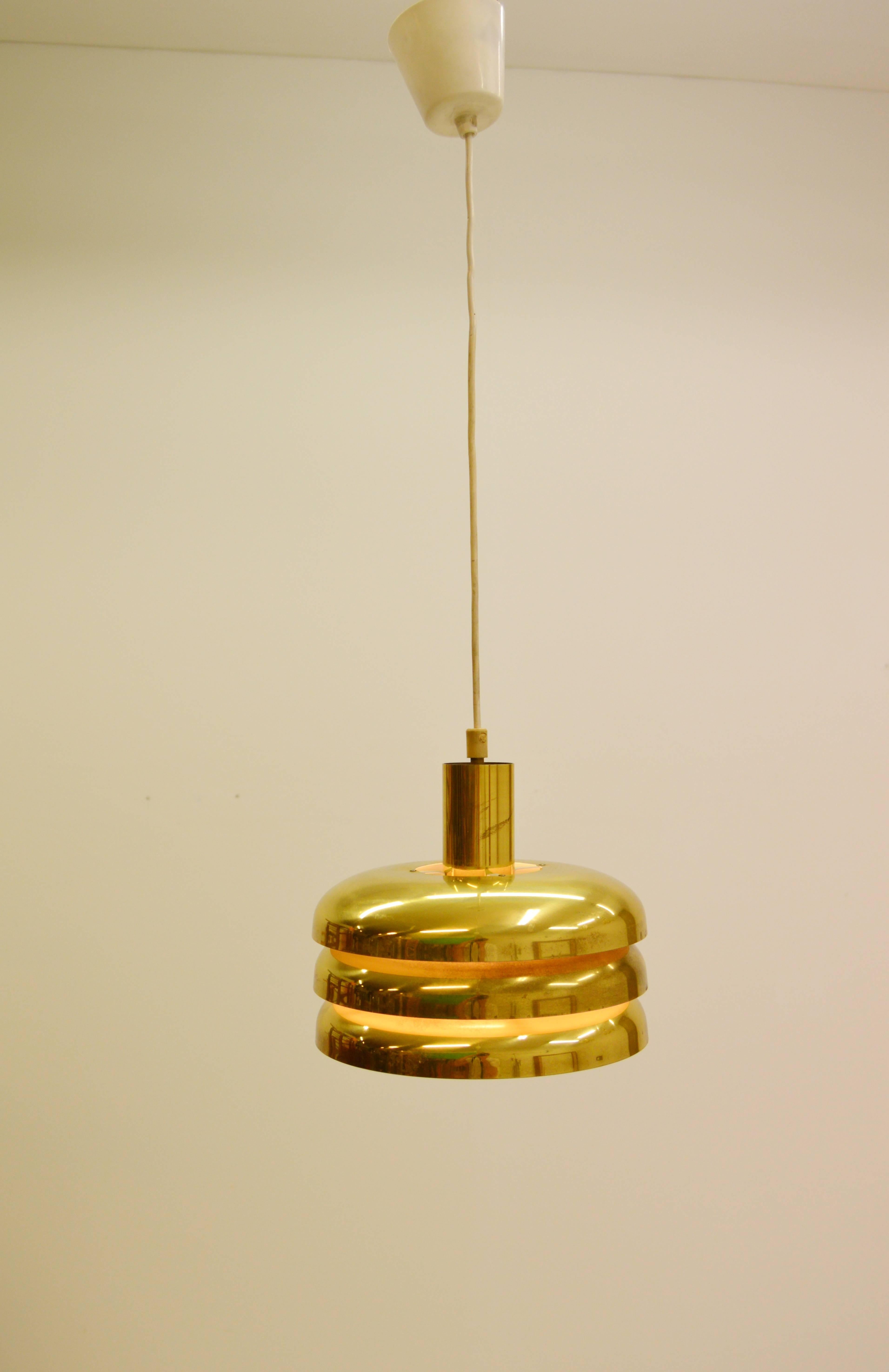 Brass ceiling light by Hans-Agne Jakobsson Markaryd, Sweden.
Three levels. White lacquered inside.