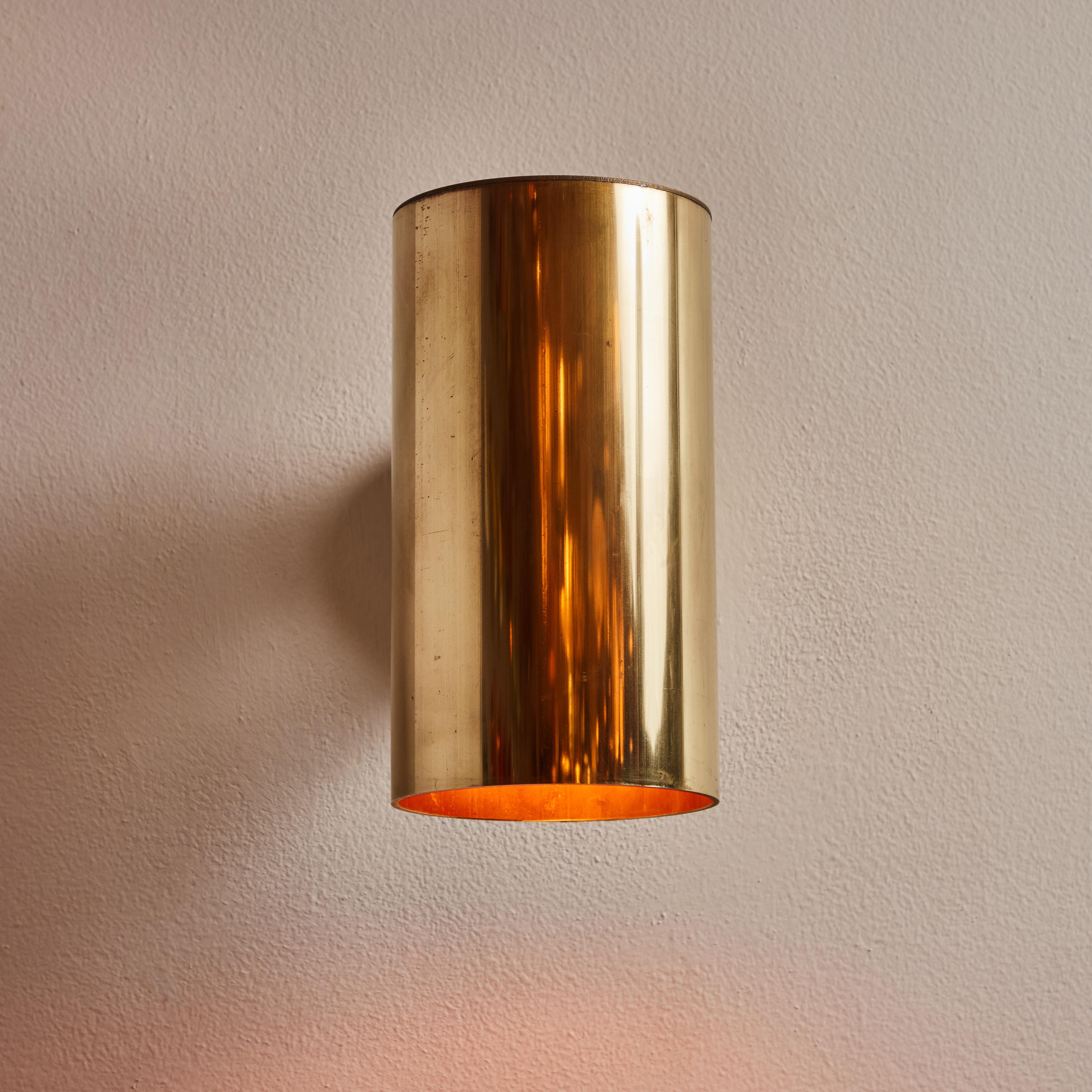 Hans-Agne Jakobsson C 627/110 'Rulle' raw brass outdoor sconce. An exclusive made for U.S. and UL listed authorized re-edition of the classic Swedish design executed in raw unlacquered and unpolished brass. Suitable for both outdoor or indoor use. 