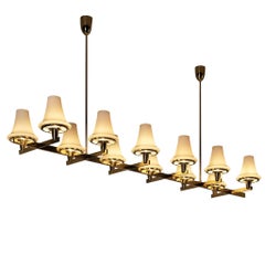 Hans-Agne Jakobsson
C1280
Chandelier in Brass and White Glass 8.2ft