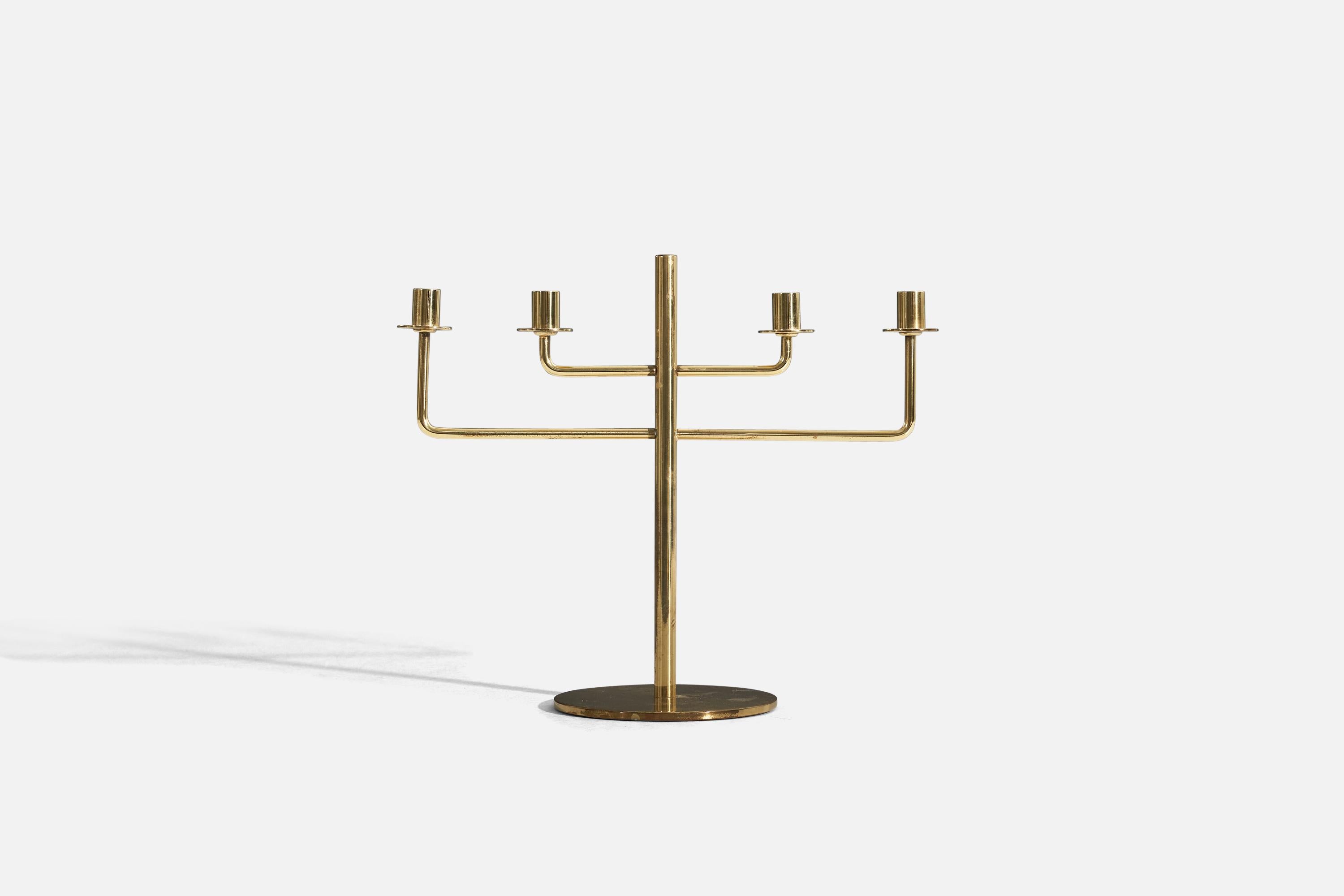 A brass candelabra designed by Hans Agne Jakobsson and produced by Hans-Agne Jakobsson AB, Sweden, 1960s.

Takes 4 small candles.