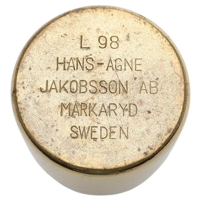 Tauchen Sie ein in die zeitlose Schönheit der Messing-Kerzenhalter von Hans-Agne Jakobsson, dem Inbegriff des skandinavischen modernen Stils aus der Mitte des Jahrhunderts. Diese mit außergewöhnlicher Kunstfertigkeit und Liebe zum Detail gefertigten