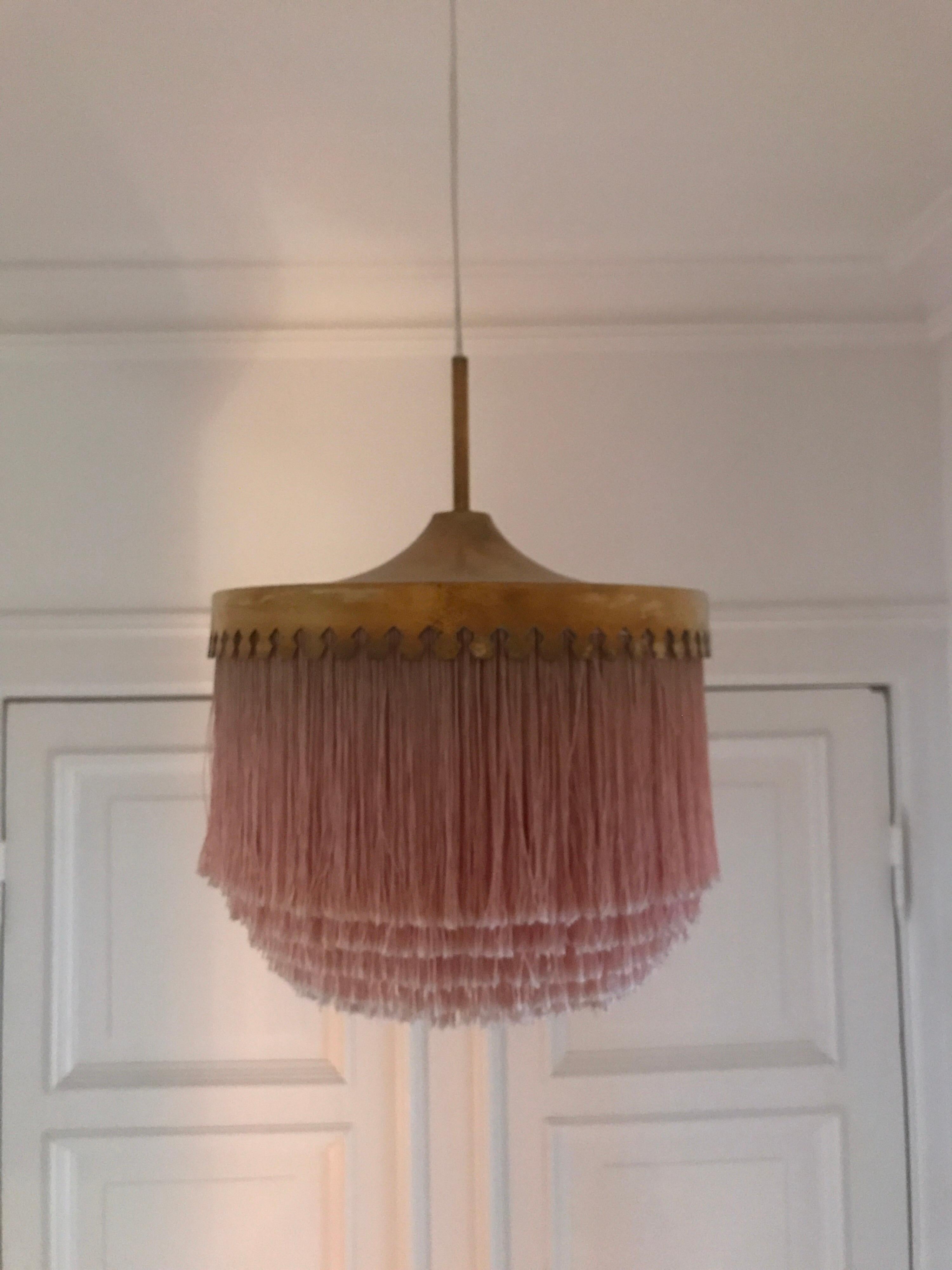 Hans Agne Jakobsson, ceiling lamp, Sweden, 1960s
Pink fringed lamp.