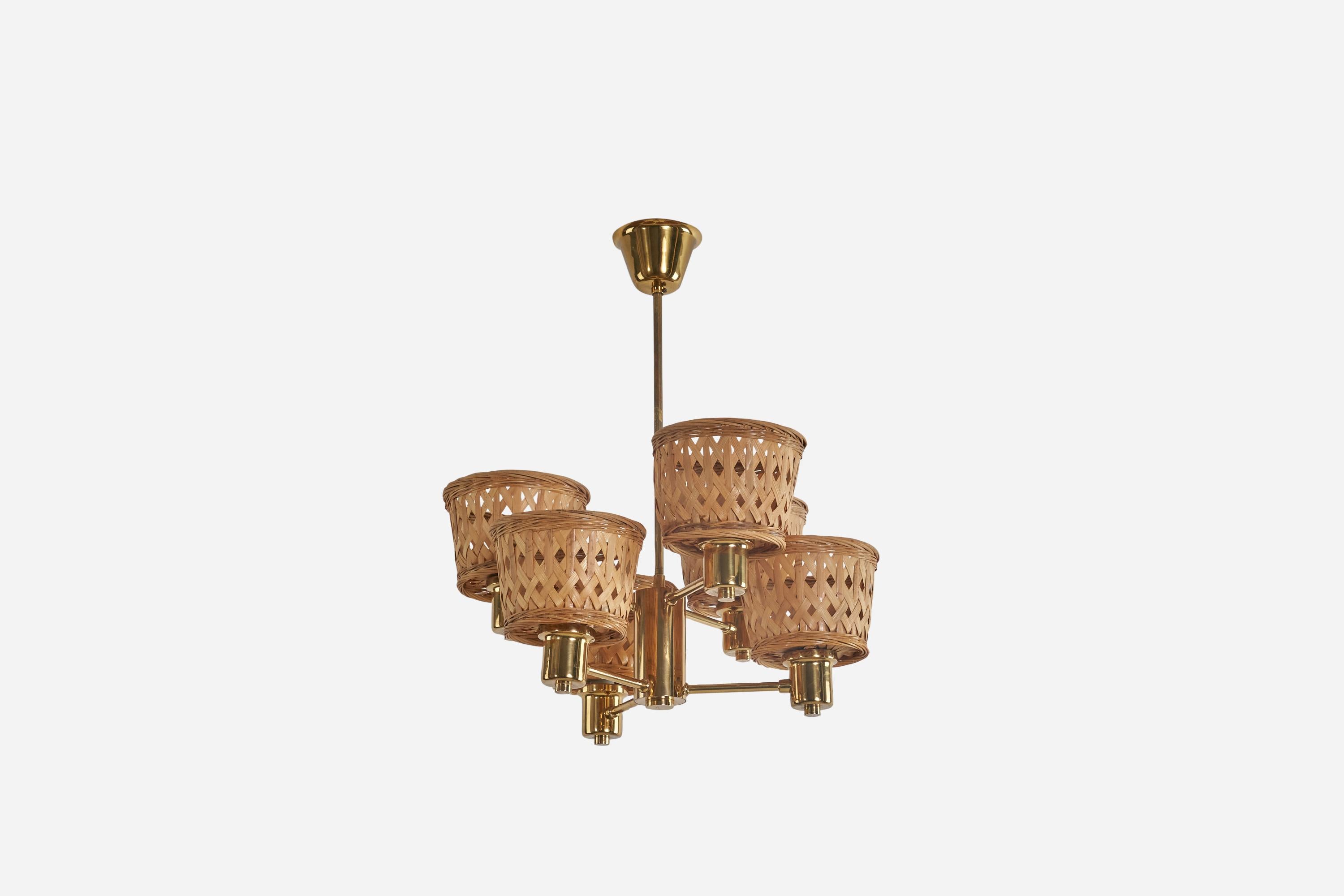 A brass and rattan chandelier designed and produced by Hans-Agne Jakobsson, Sweden, 1960s.

Sold with Lampshade(s). 
Stated dimensions refer to the Chandelier with the Shade(s).
Dimensions of Canopy (inches) : 2.4 x 3.94 x 3.94 (Height x Width x
