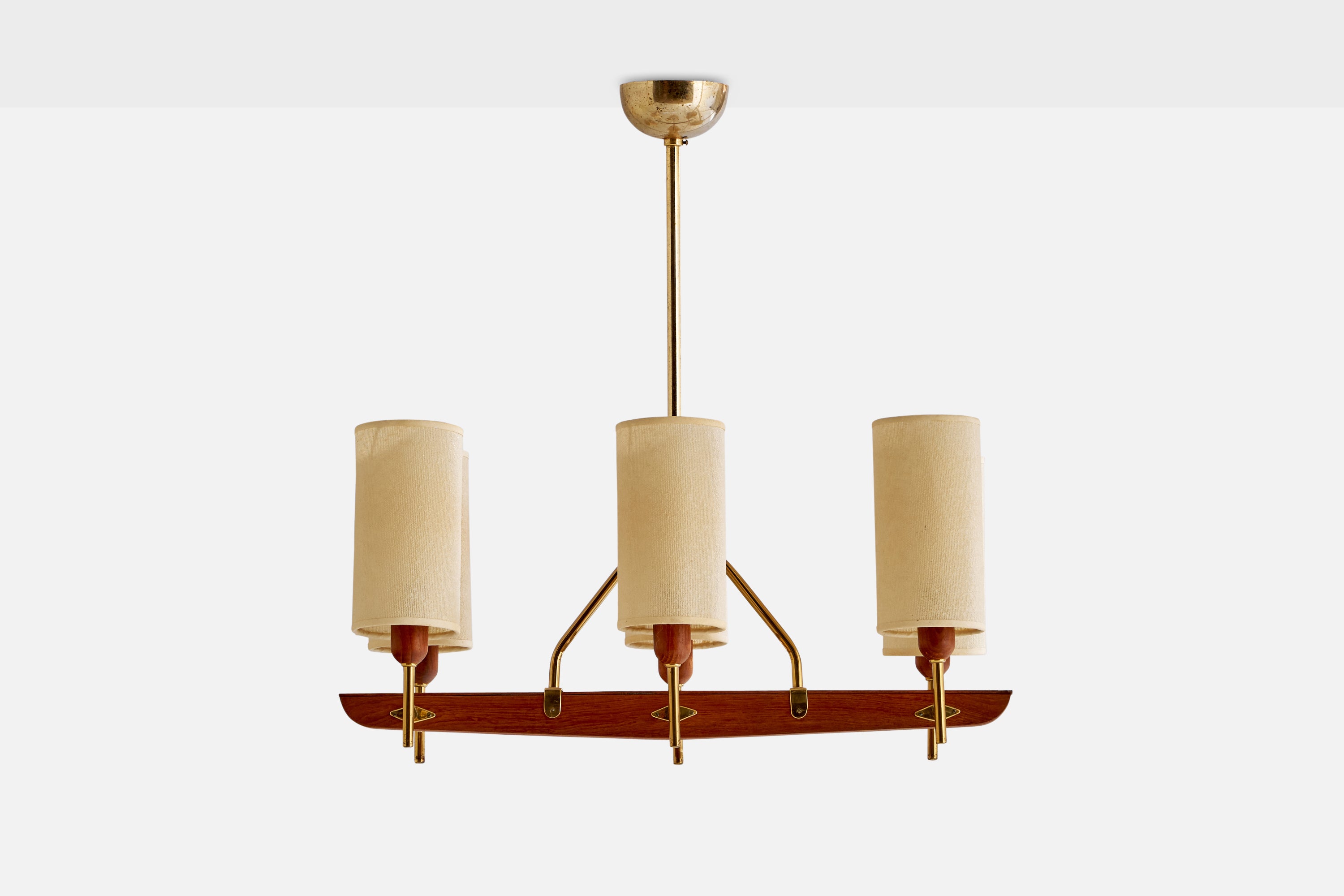 A brass, off-white fabric and teak chandelier designed and produced by Hans-Agne Jakobsson, Sweden, 1950s.

Dimensions of canopy (inches): 2” H x 3.7”  Diameter
Socket takes standard E-14 bulbs. 6 sockets.There is no maximum wattage stated on the