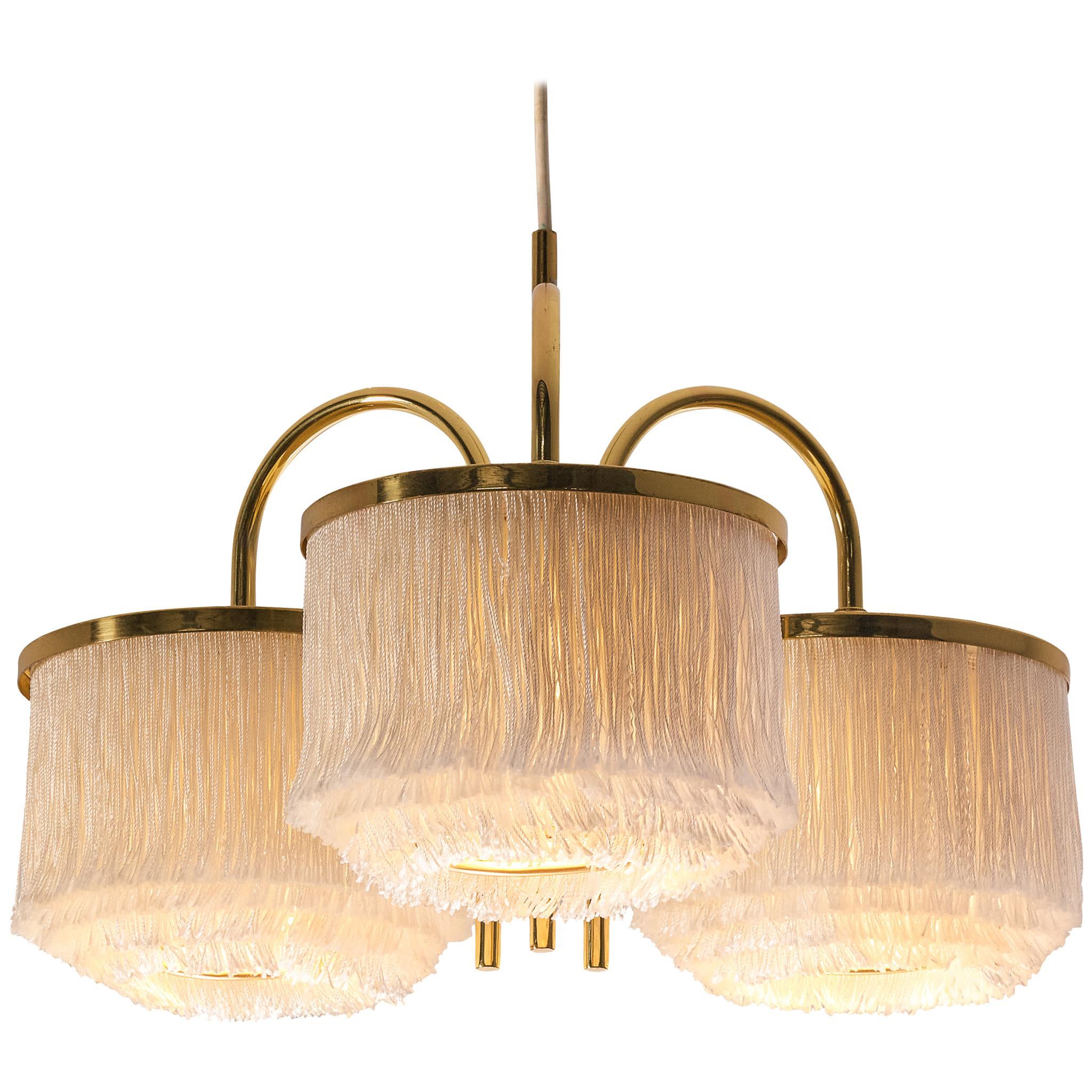 Lampadario di Hans-Agne Jakobsson in ottone con fili di seta