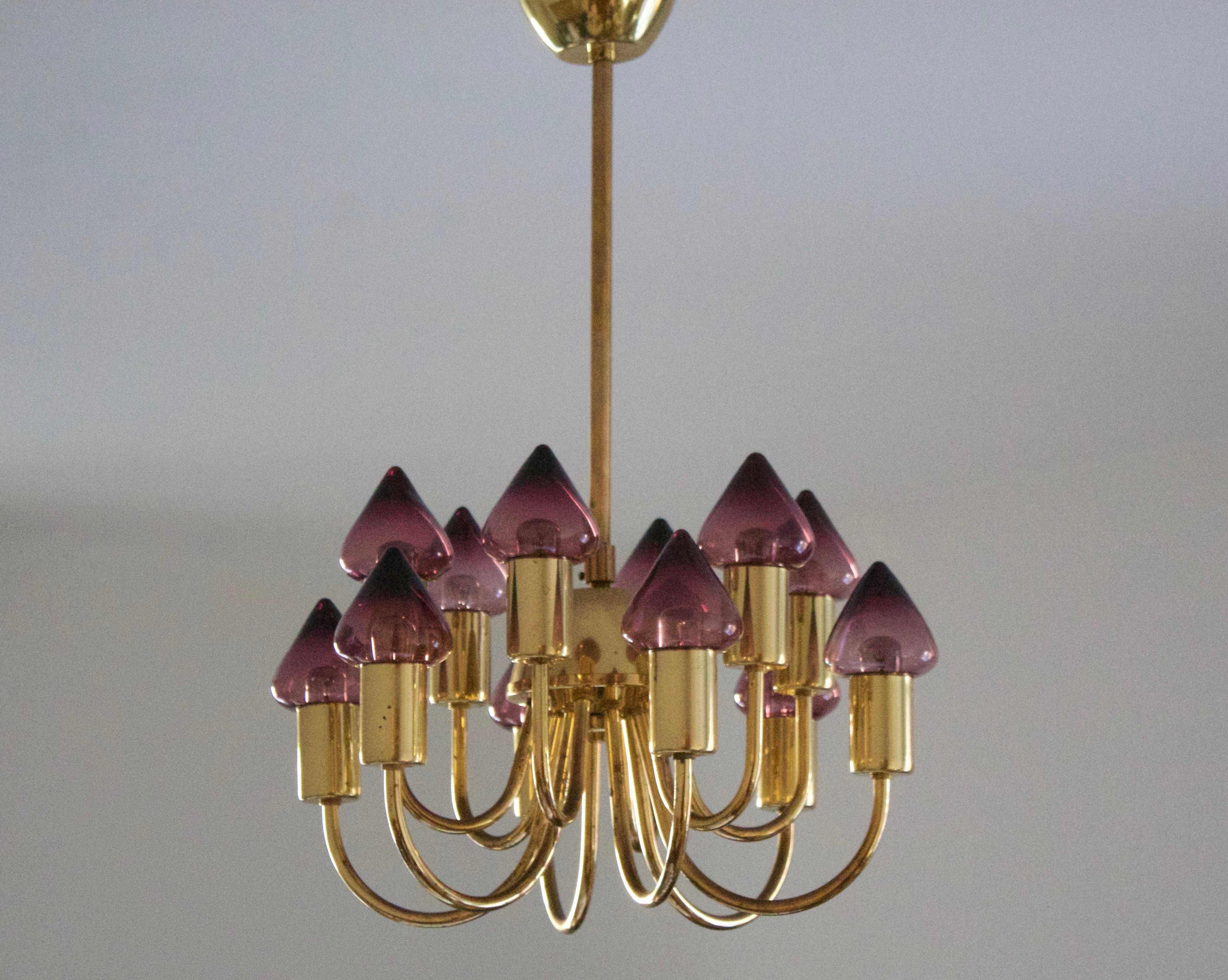 A chandelier light, designed by Hans-Agne Jakobsson for his own firm in Markaryd, Sweden. c. 1970s. Labeled.