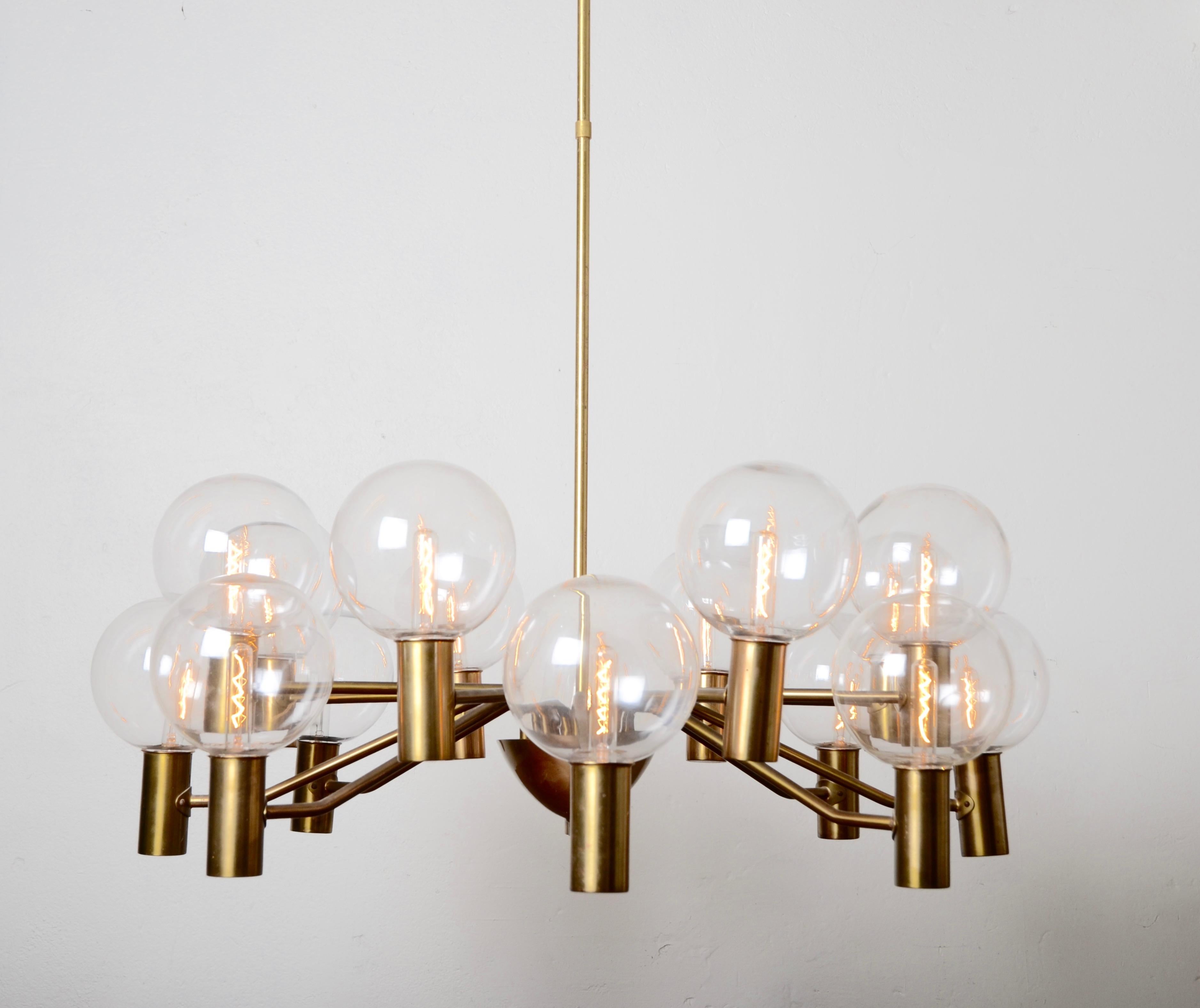 A chandelier in glass and brass, designed by Hans-Agne Jakobsson for Markaryd AB, 1960s-1970s.