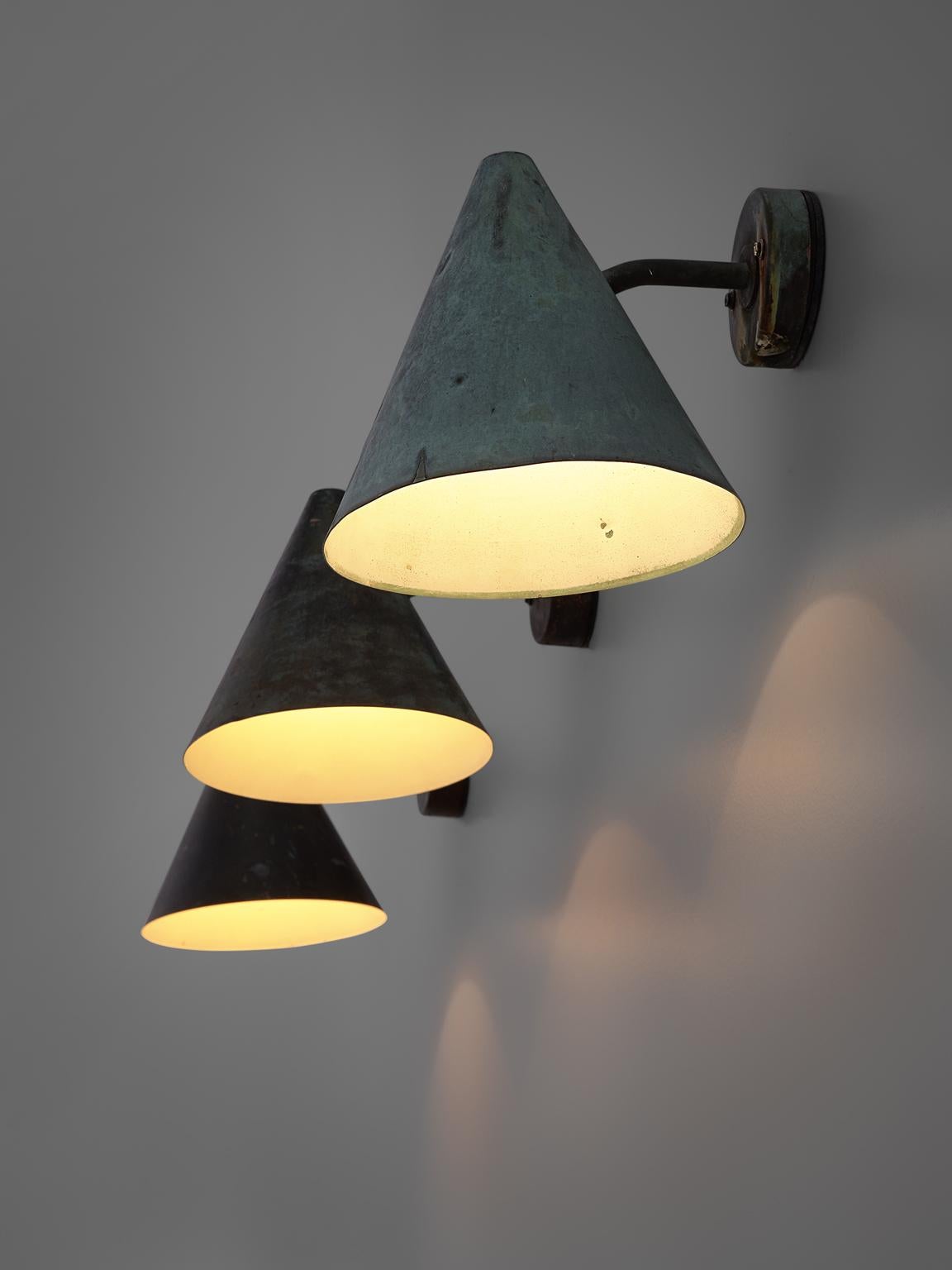 Hans-Agne Jakobsson for AB Markaryd, set of wall lights, copper, by Sweden, 1950s. 

Set of cone-shaped wall lights designed by Hans-Agne Jakobsson for AB Markaryd, in beautifully patinated copper with an off-white interior. The light this model