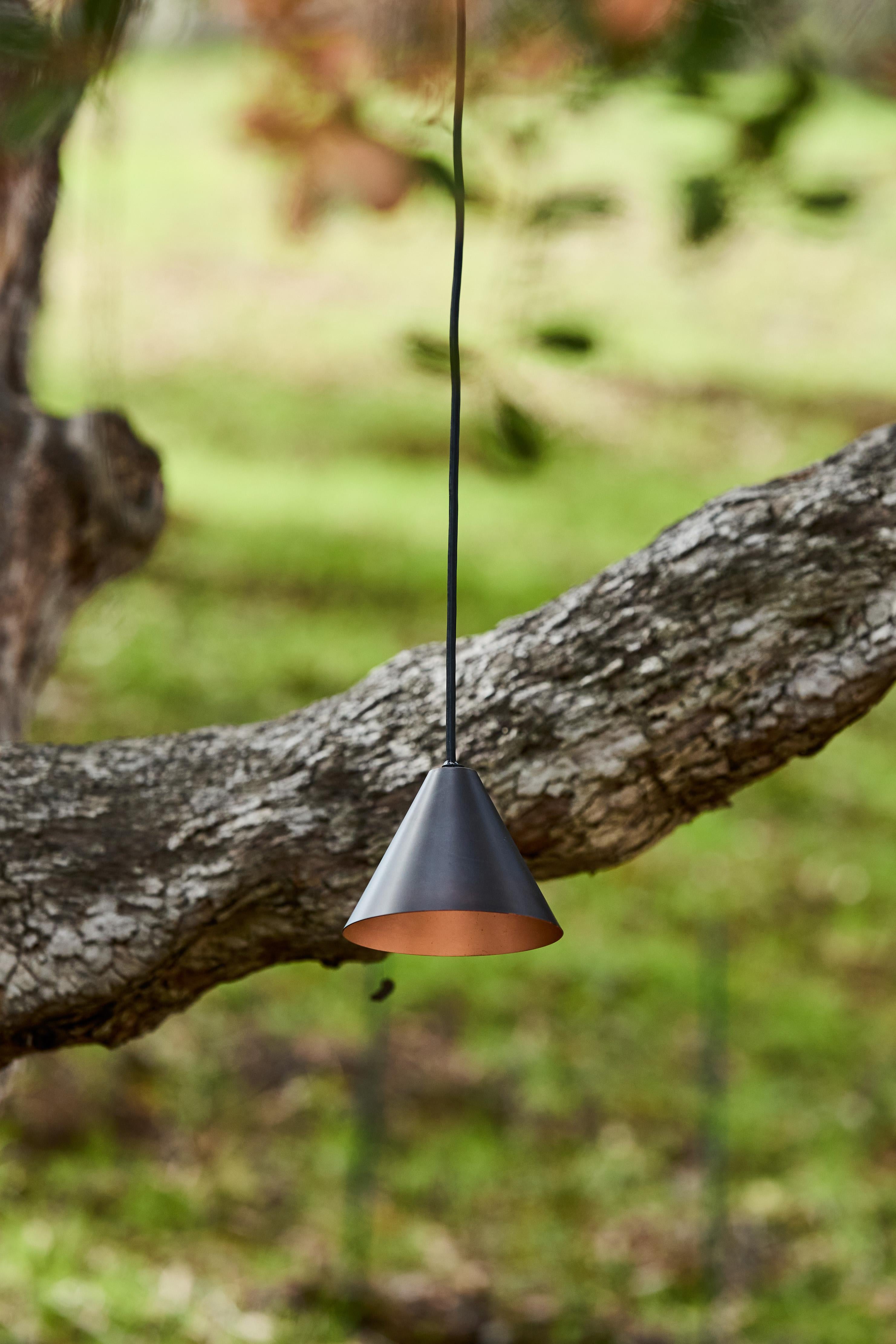 Hans-Agne Jakobsson Dark Brown Patinated 'Mini-Tratten' Outdoor Pendant.

An exclusive made for U.S. and UL listed authorized re-edition of the classic Swedish design from Jakobsson, Executed in dark brown patinated metal with a burnished interior