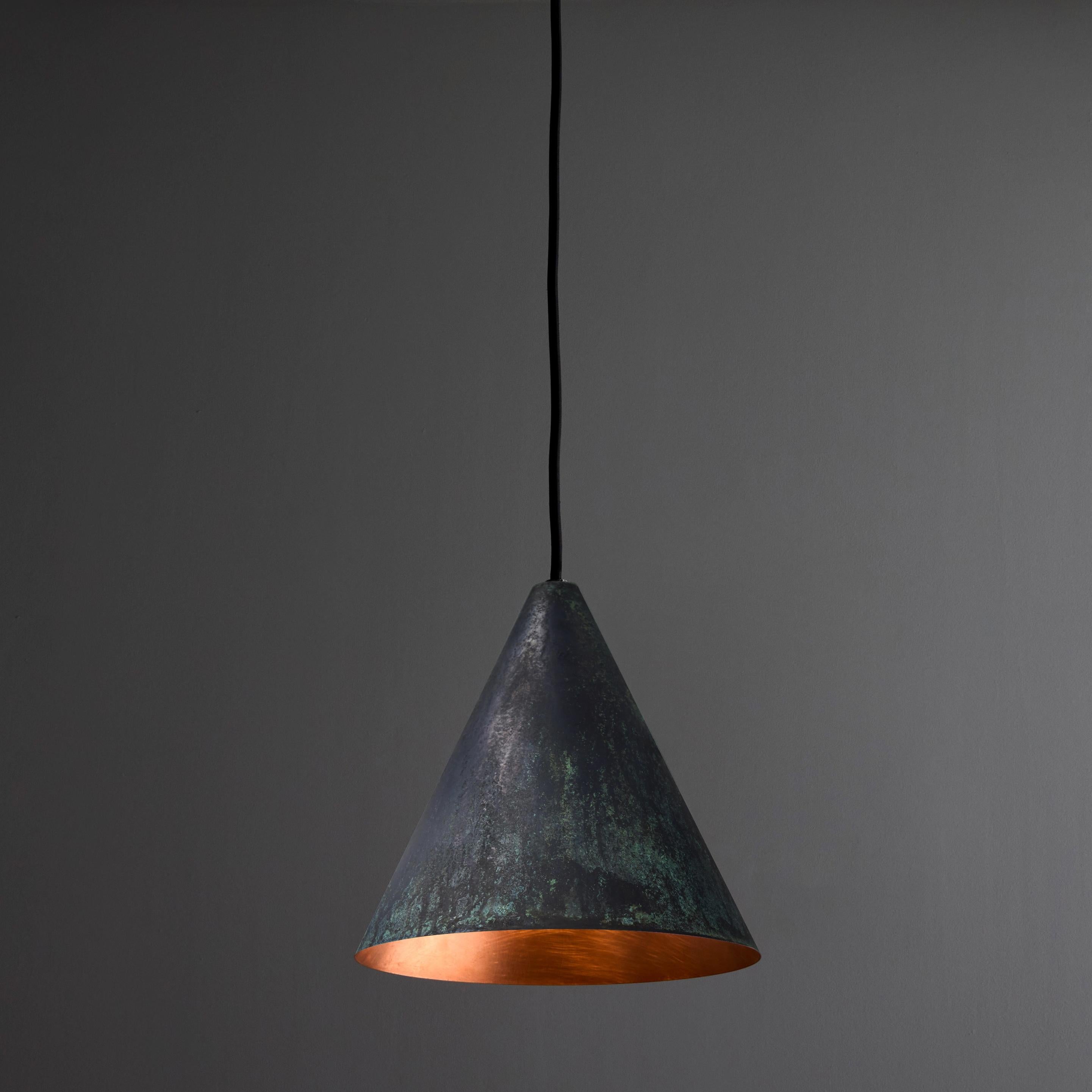 Hans-Agne Jakobsson Darkly Patinated 'Tratten' Outdoor Pendant.

An exclusive made for U.S. and UL listed authorized re-edition of the classic Swedish design from Jakobsson, executed in richly patinated metal with a burnished interior finish. An