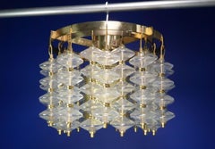 Hans Agne Jakobsson Estrella Clear Glass, Brass Chandelier, 1966