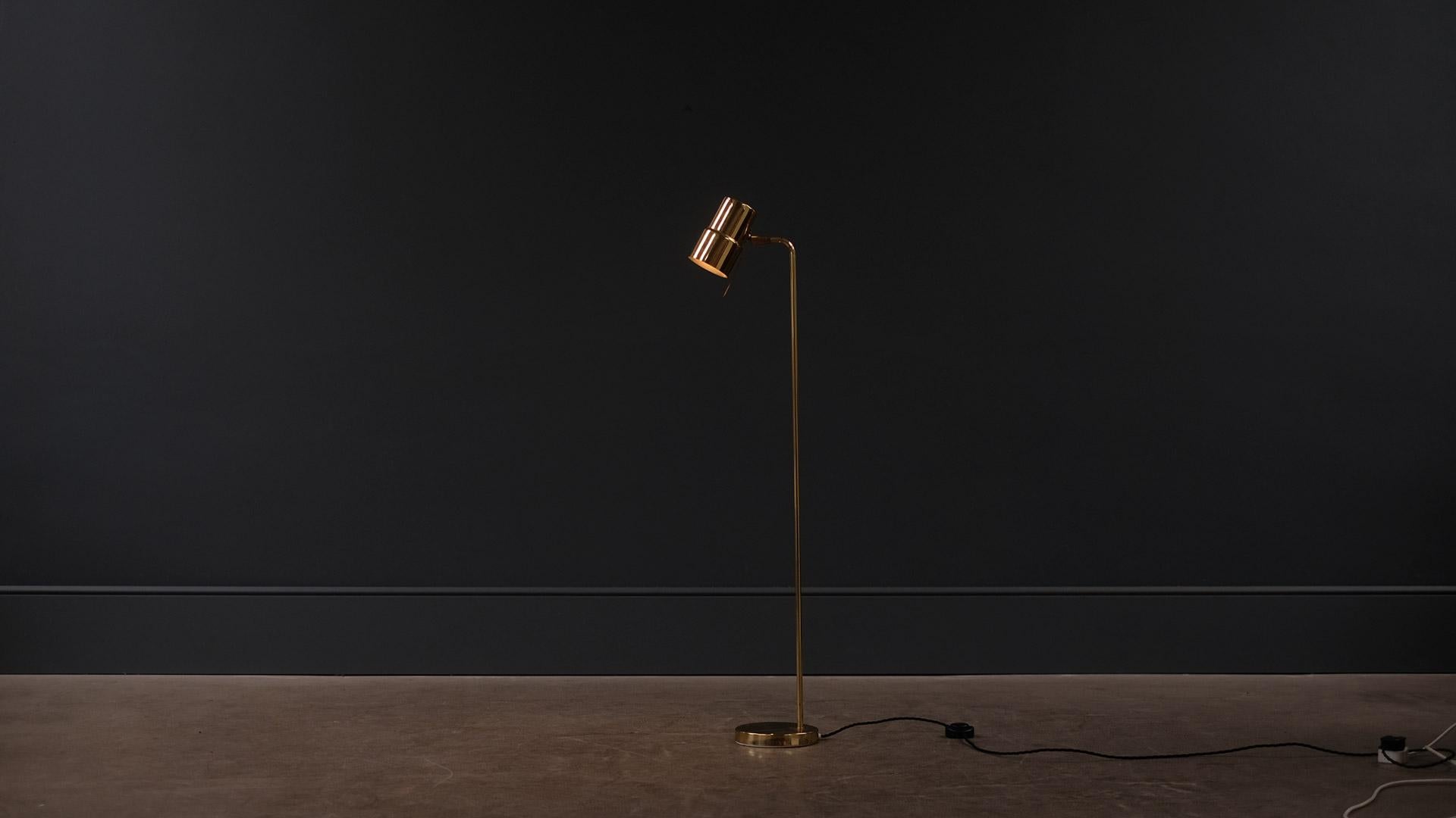 Beautiful floor lamp model G-154 in brass designed by Hans-Agne Jakobsson for AB Markaryd, Sweden, 1950s. Fully adjustable shade. Rewired and PAT tested.