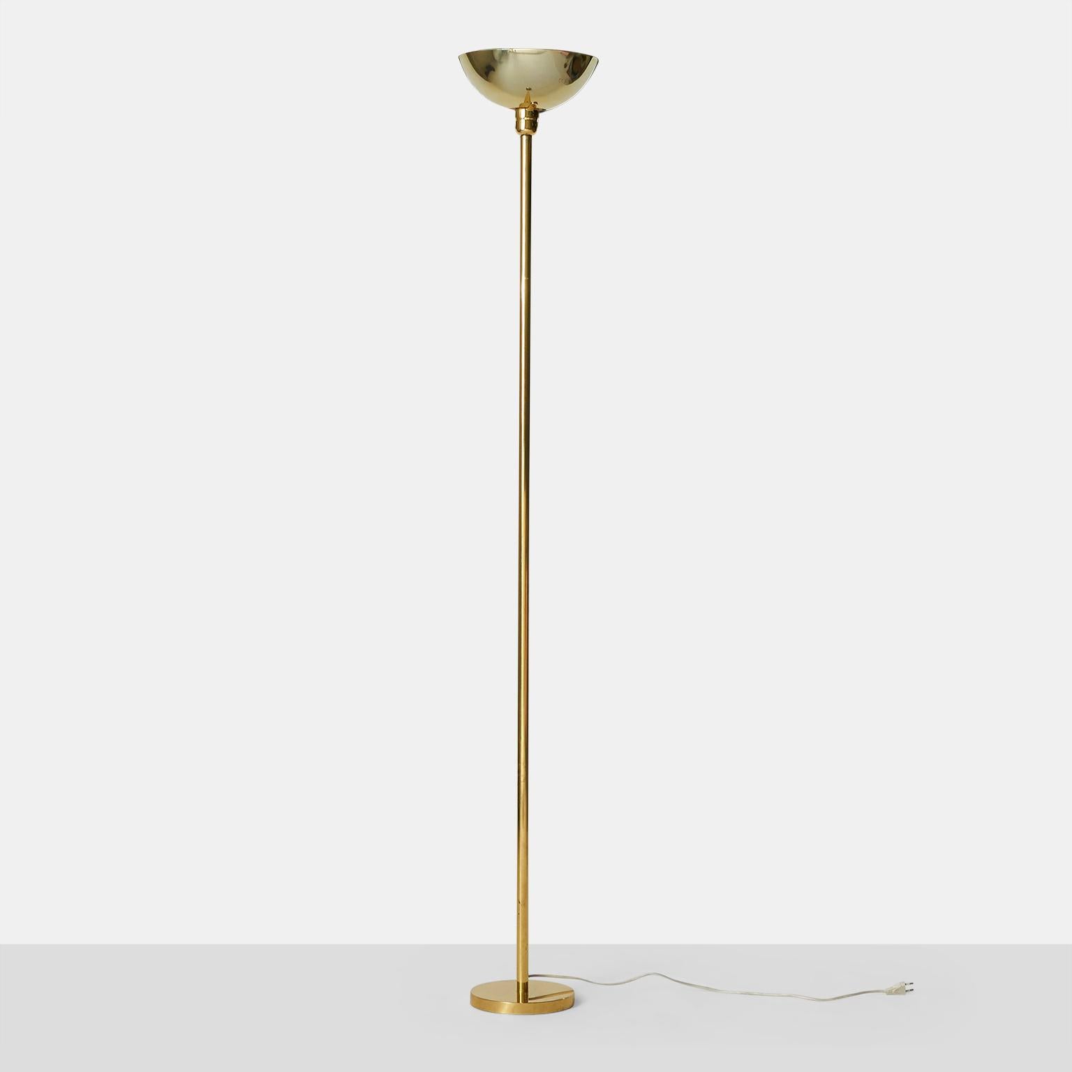 A torchiere style floor lamp, by Hans Agne Jakobsson, in brass for Markaryd.