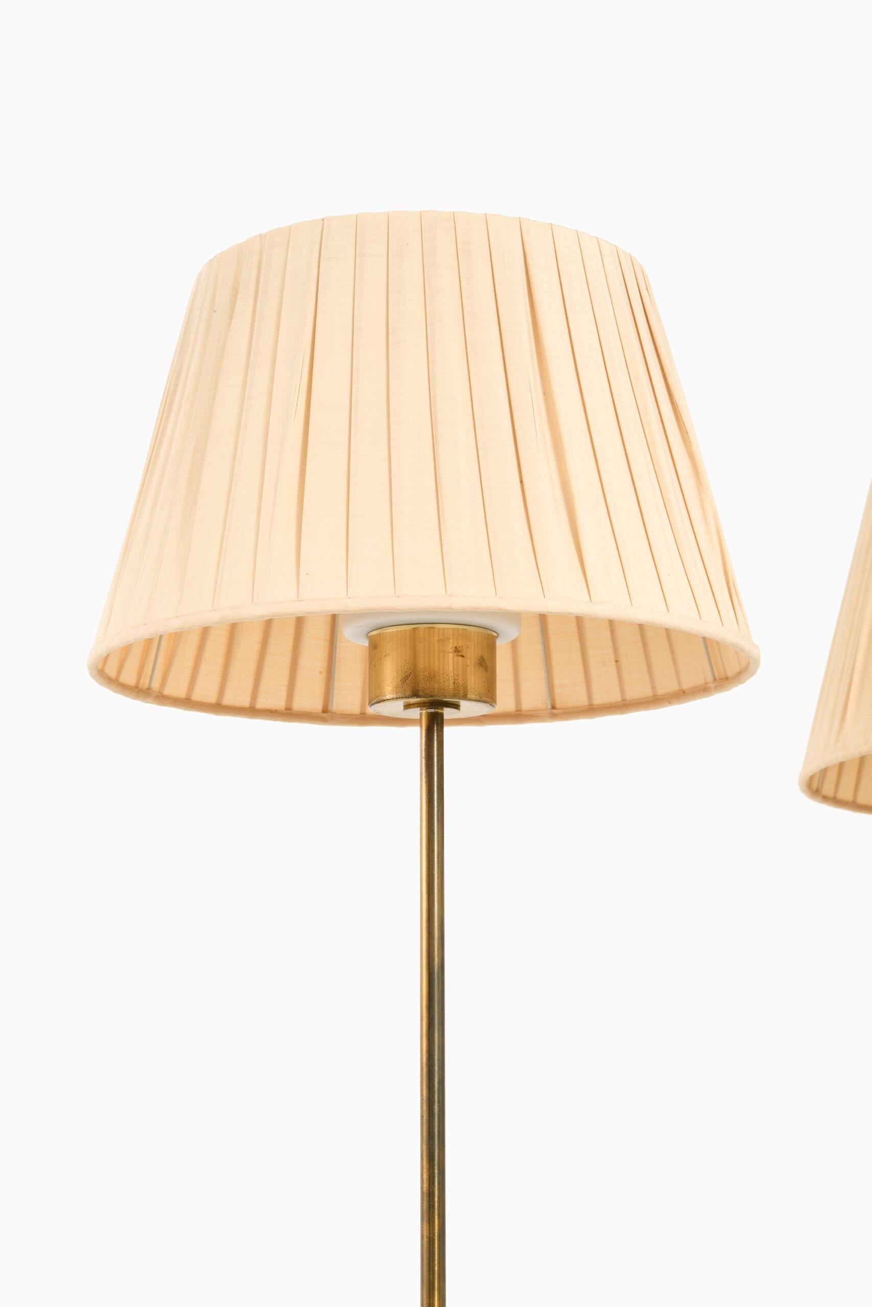 Rare pair of floor lamps model G-50 designed by Hans-Agne Jakobsson. Produced by Hans-Agne Jakobsson AB in Markaryd, Sweden.