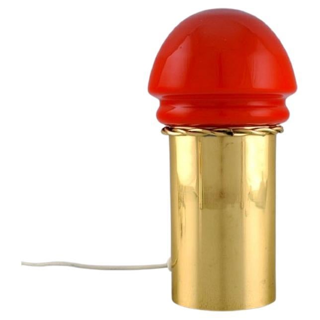 Hans Agne Jakobsson for A / B Markaryd.  Brass table lamp with red shade For Sale