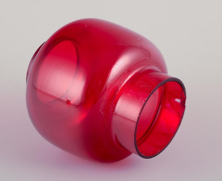 Swedish Hans-Agne Jakobsson for A/B Markaryd. Candle holder in brass and red glass.